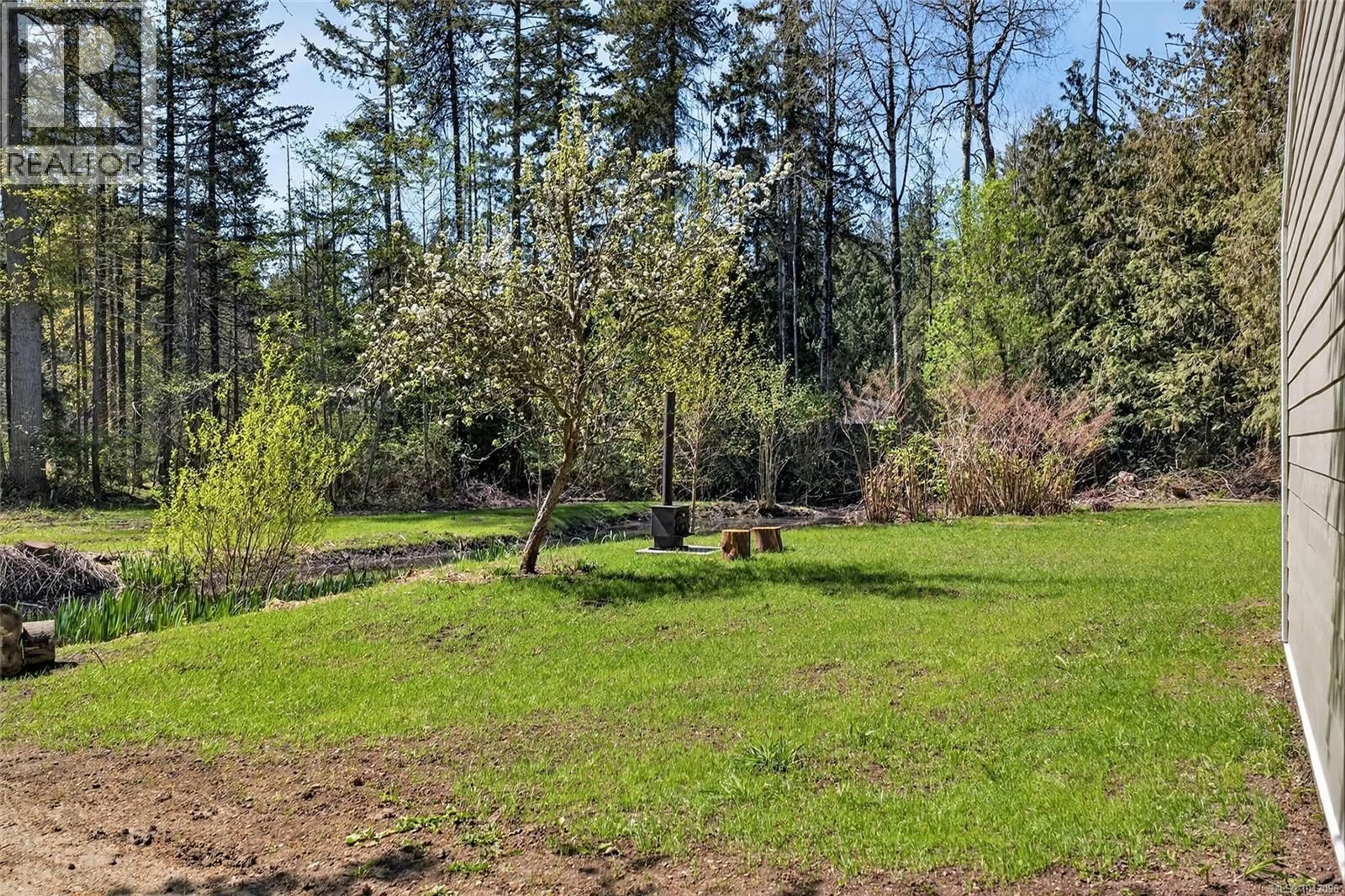 A pic from outside/outdoor area/front of a property/back of a property/a pic from drone, forest/trees view for 400 MANSE ROAD, French Creek British Columbia V9Y2B2