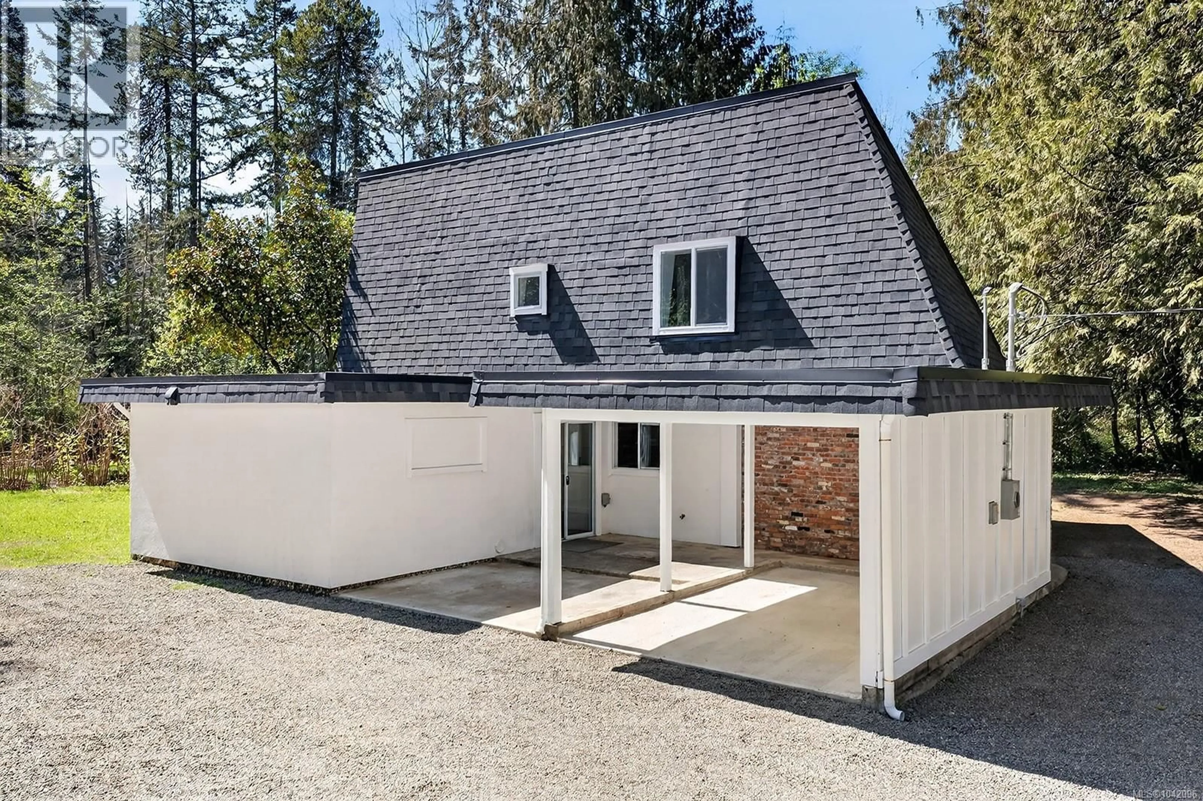 A pic from outside/outdoor area/front of a property/back of a property/a pic from drone, street for 400 MANSE ROAD, French Creek British Columbia V9Y2B2