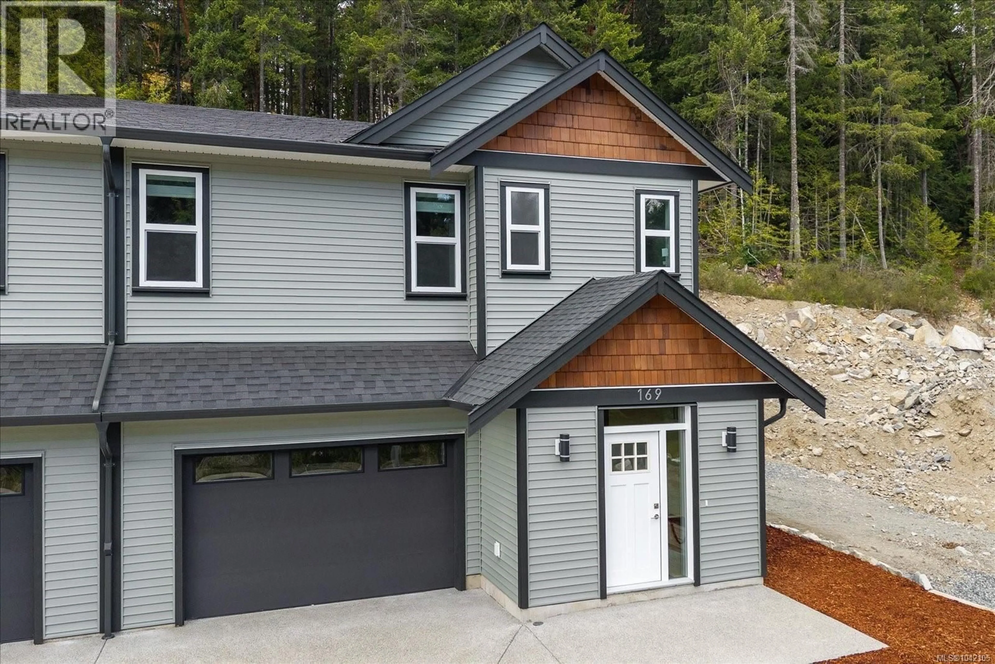 Home with vinyl exterior material, street for 169 HUNTER WAY, Ladysmith British Columbia V9G1N4