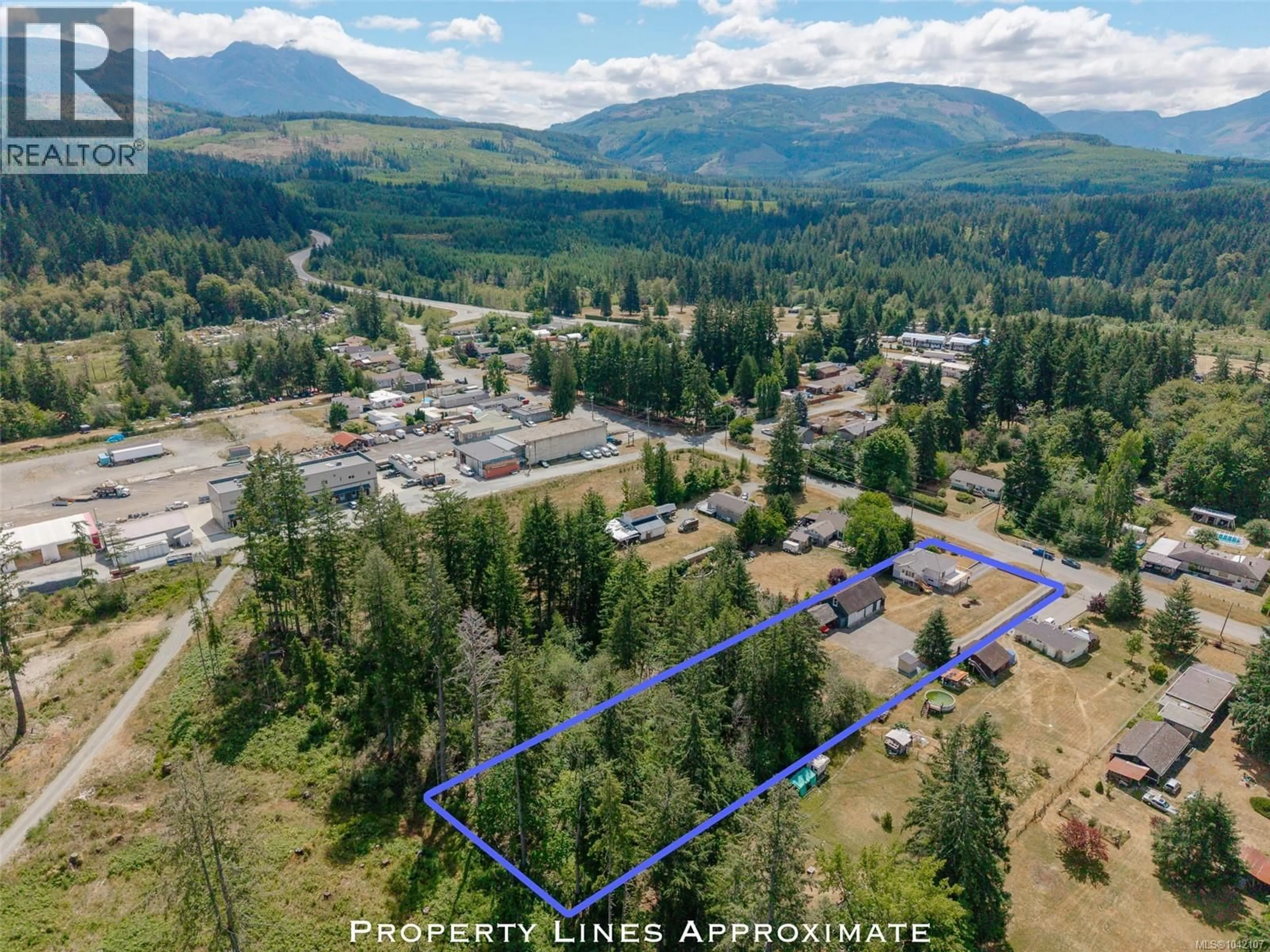 A pic from outside/outdoor area/front of a property/back of a property/a pic from drone, mountain view for 2453 OLD NANAIMO HIGHWAY, Port Alberni British Columbia V9Y8P6