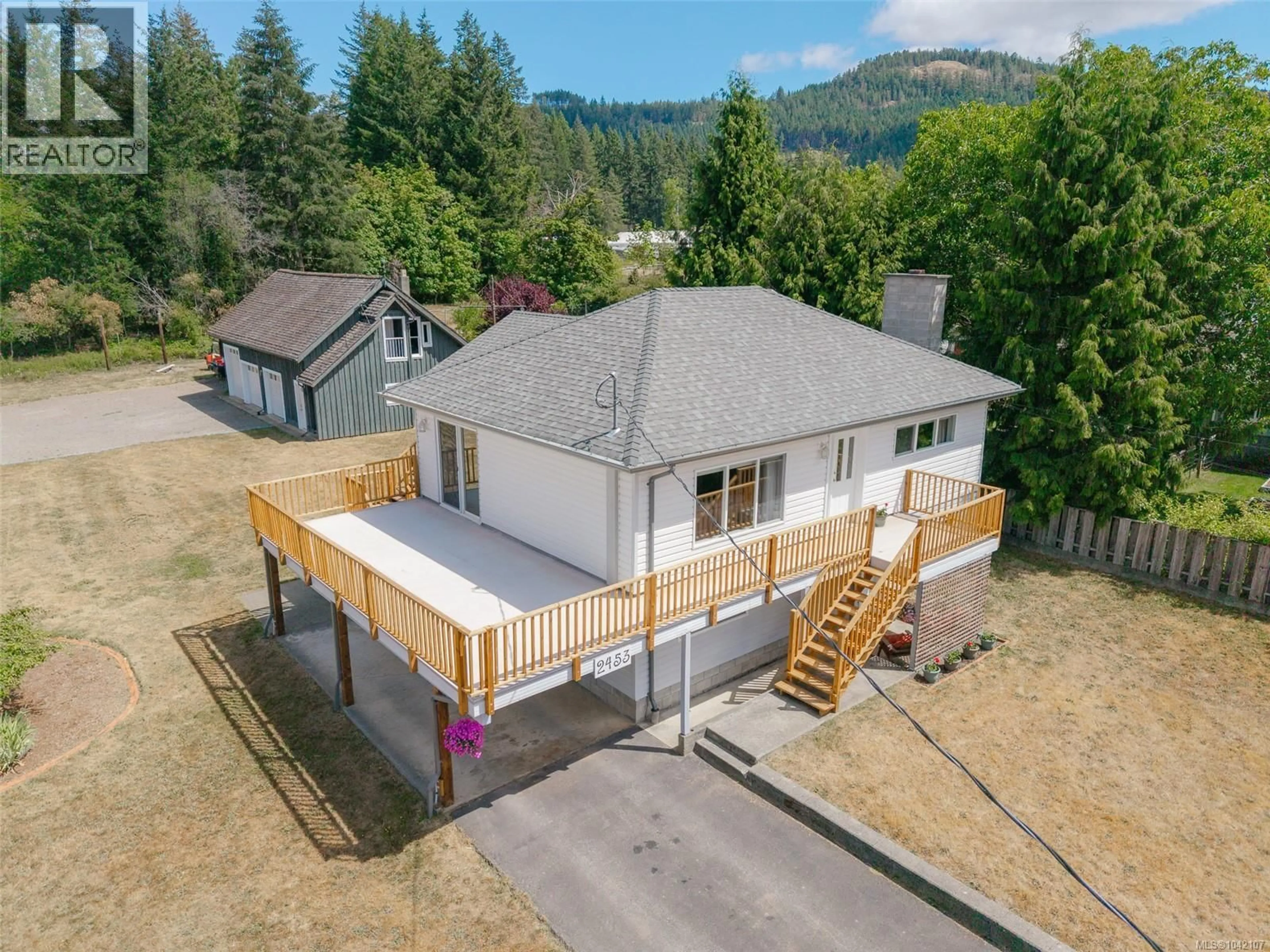 A pic from outside/outdoor area/front of a property/back of a property/a pic from drone, mountain view for 2453 OLD NANAIMO HIGHWAY, Port Alberni British Columbia V9Y8P6