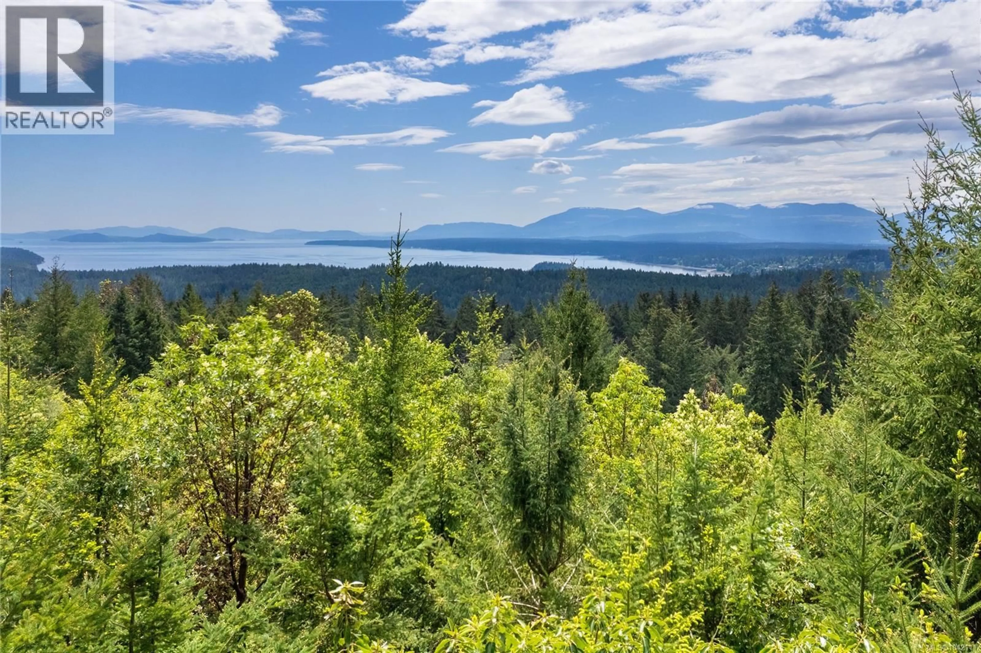 A pic from outside/outdoor area/front of a property/back of a property/a pic from drone, forest/trees view for 1495 COATS DRIVE, Gabriola Island British Columbia V0R1X6