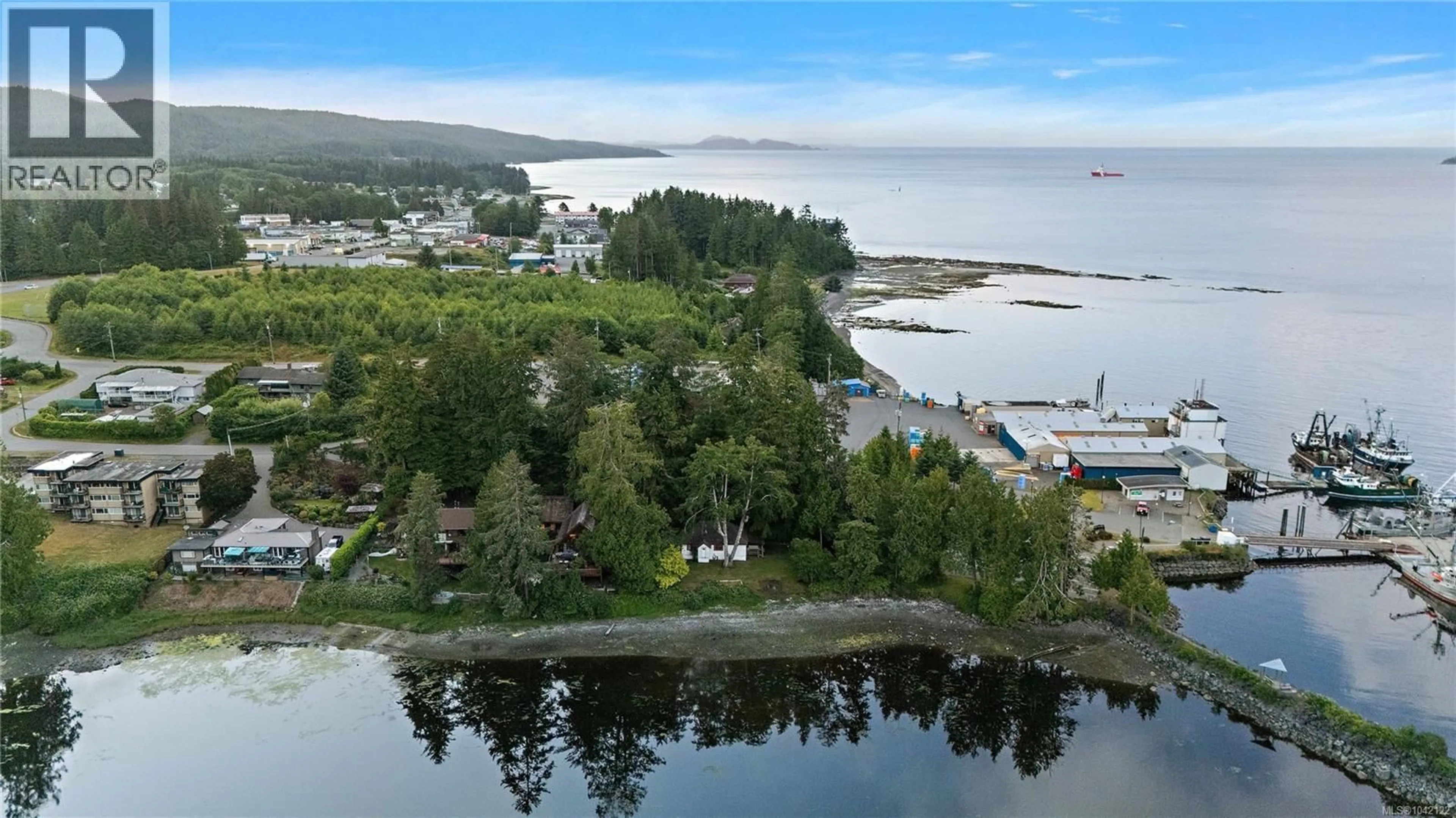 A pic from outside/outdoor area/front of a property/back of a property/a pic from drone, water/lake/river/ocean view for 8595 GLENVIEW ROAD, Port Hardy British Columbia V0N2P0
