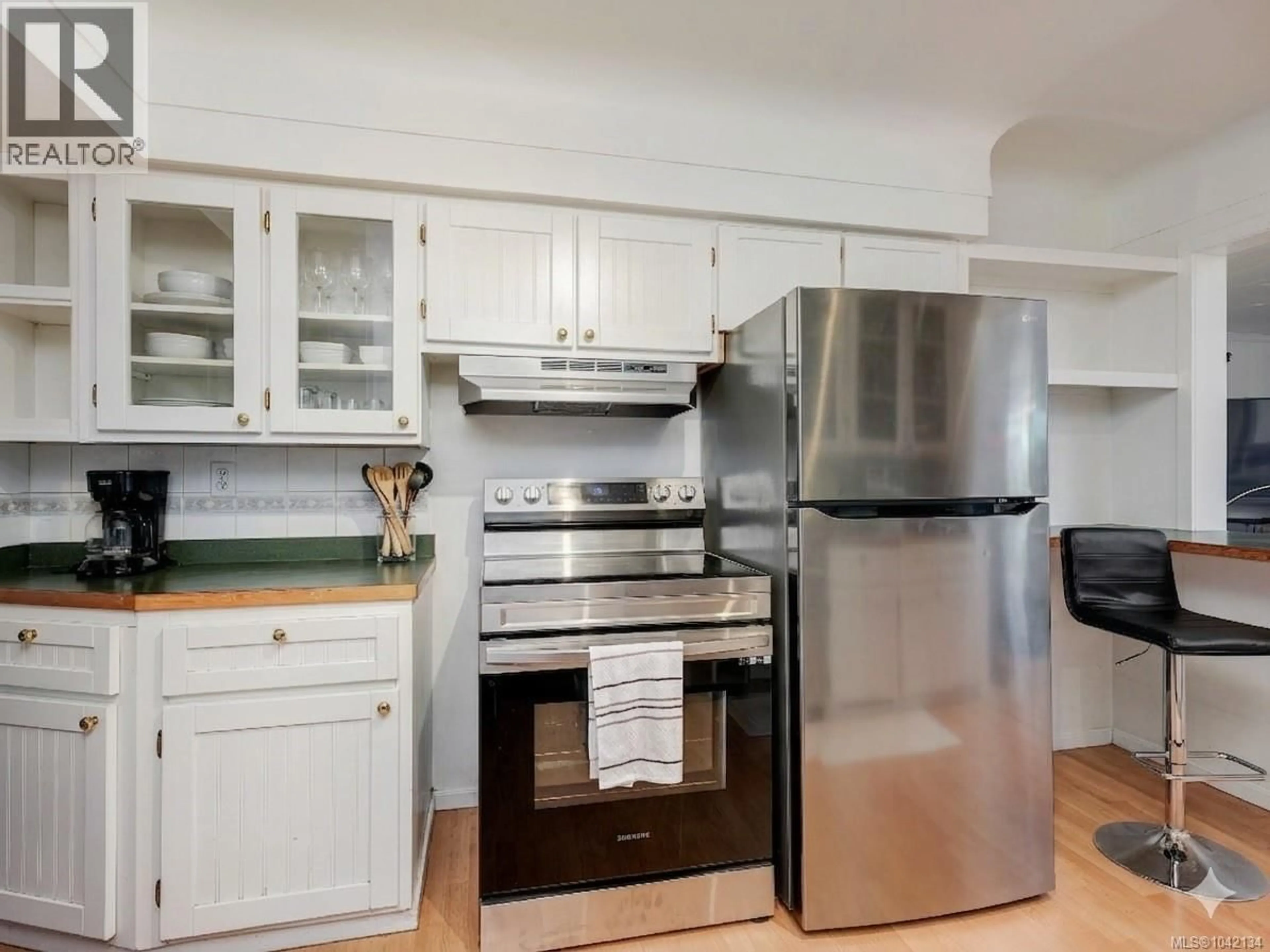 Standard kitchen, wood/laminate floor for 4071 CEDAR HILL ROAD, Saanich British Columbia V8N3C2