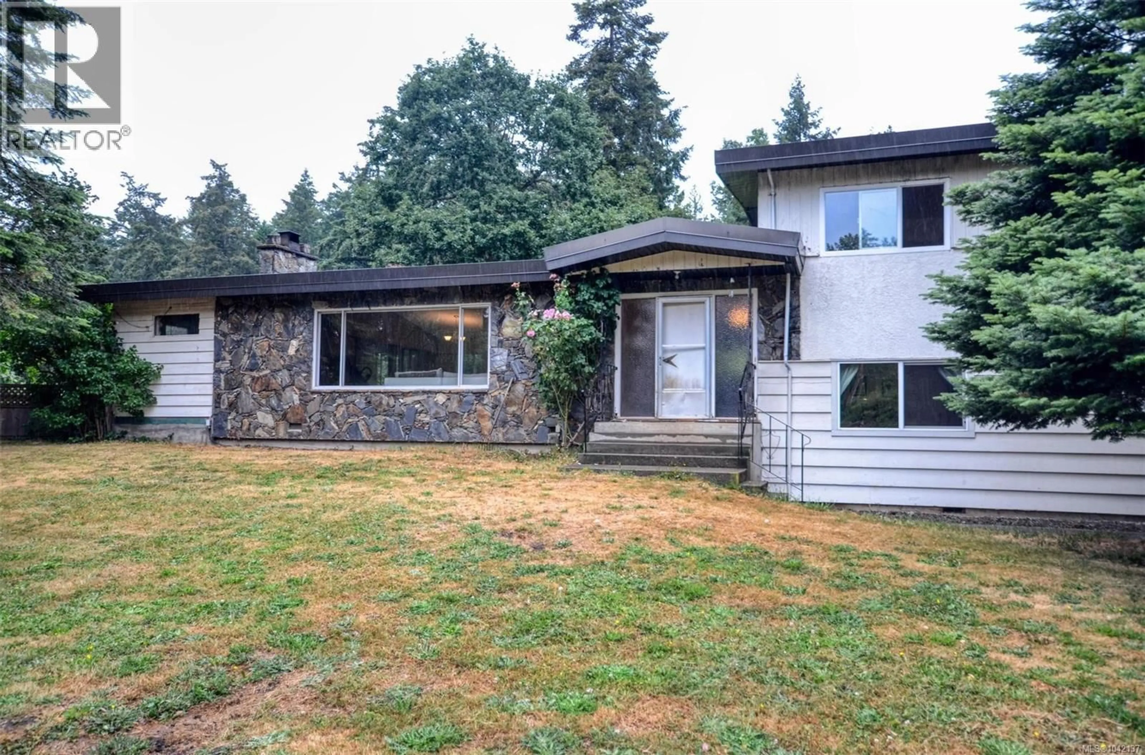 Home with vinyl exterior material, street for 1160 WAIN ROAD, North Saanich British Columbia V8L5V1