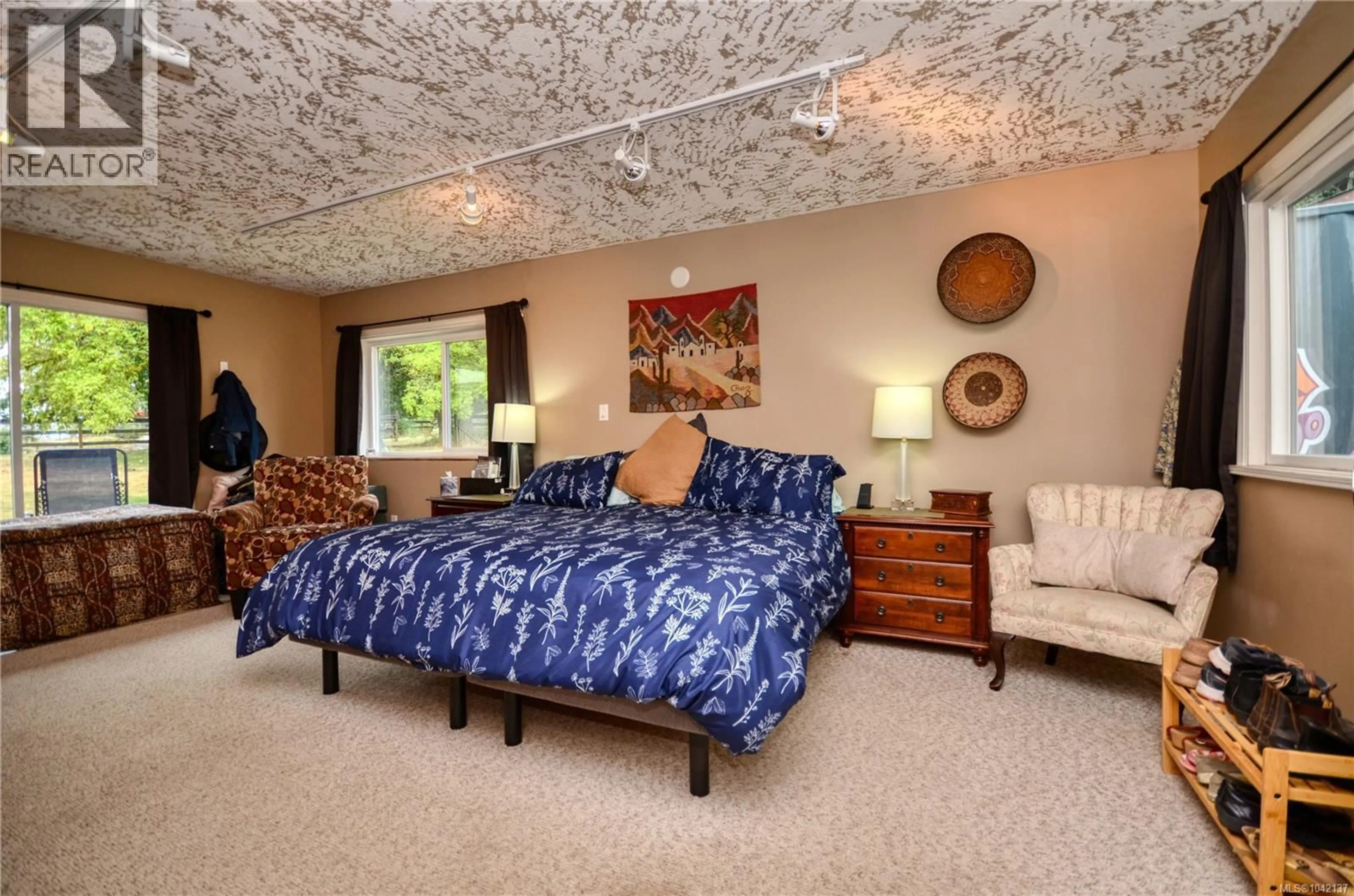 Bedroom with bed, carpet floor for 1160 WAIN ROAD, North Saanich British Columbia V8L5V1