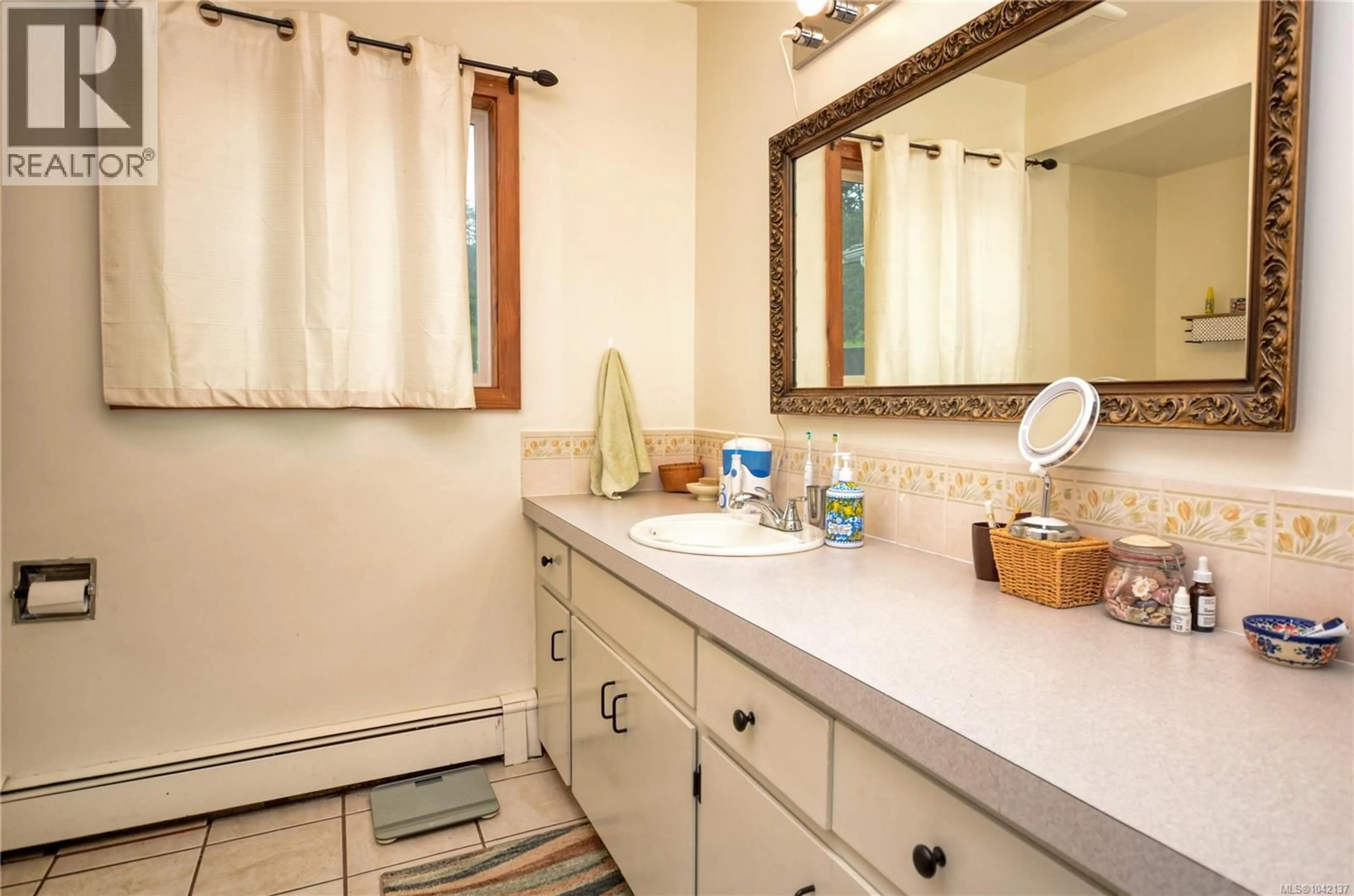 Standard bathroom, ceramic/tile floor for 1160 WAIN ROAD, North Saanich British Columbia V8L5V1