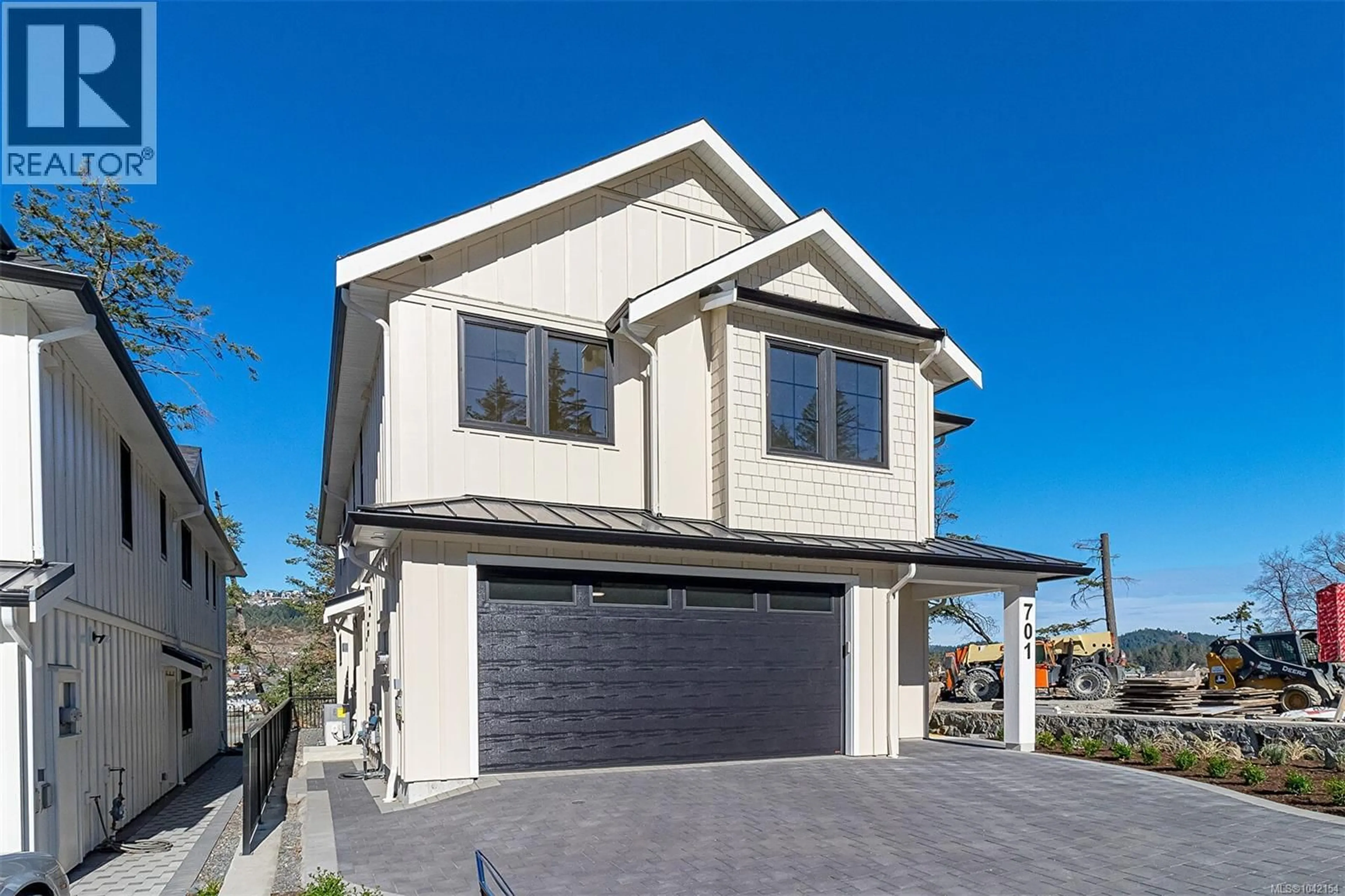 Home with vinyl exterior material, street for 701 MADRONA PLACE, Langford British Columbia V9B6C6