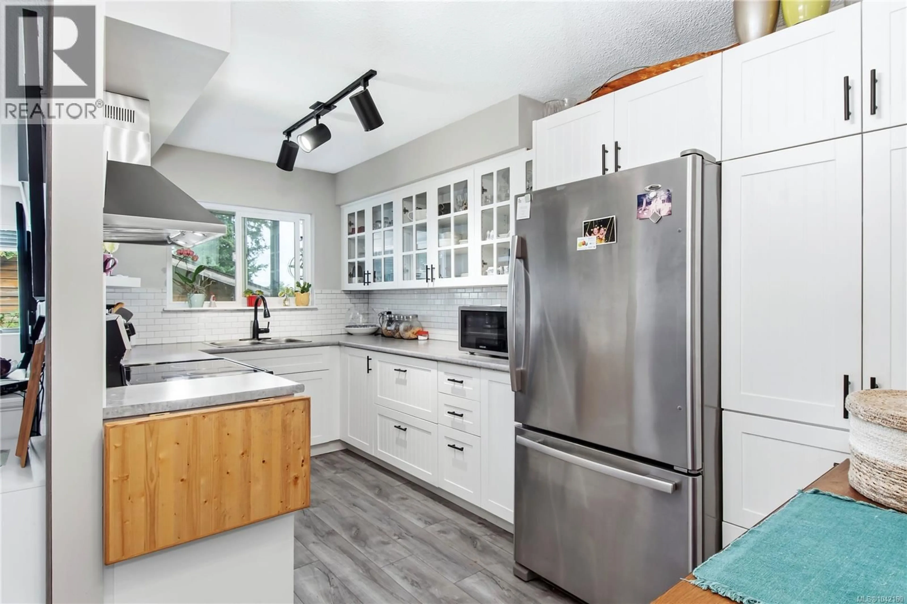 Open concept kitchen, unknown for 201 - 615 ALDER STREET, Campbell River British Columbia V9W2P3
