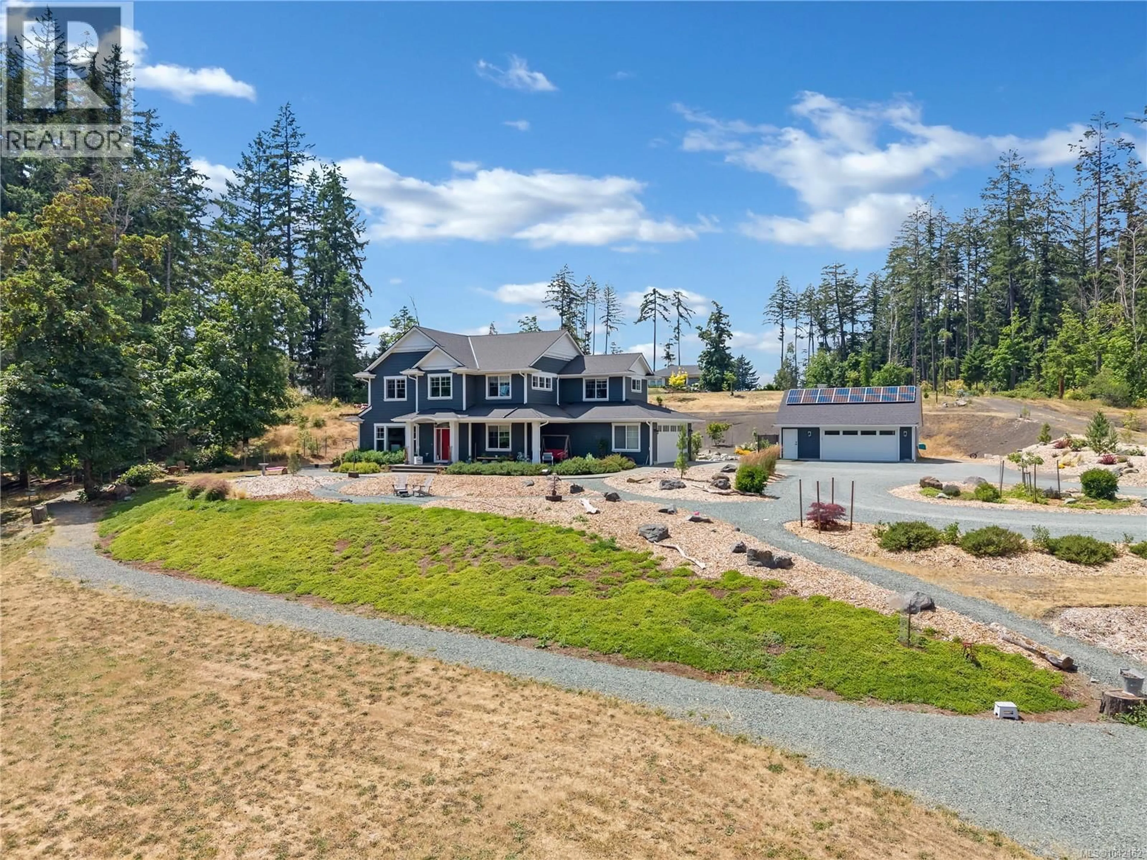 A pic from outside/outdoor area/front of a property/back of a property/a pic from drone, water/lake/river/ocean view for 6430 LAKES ROAD, Duncan British Columbia V9L5V7