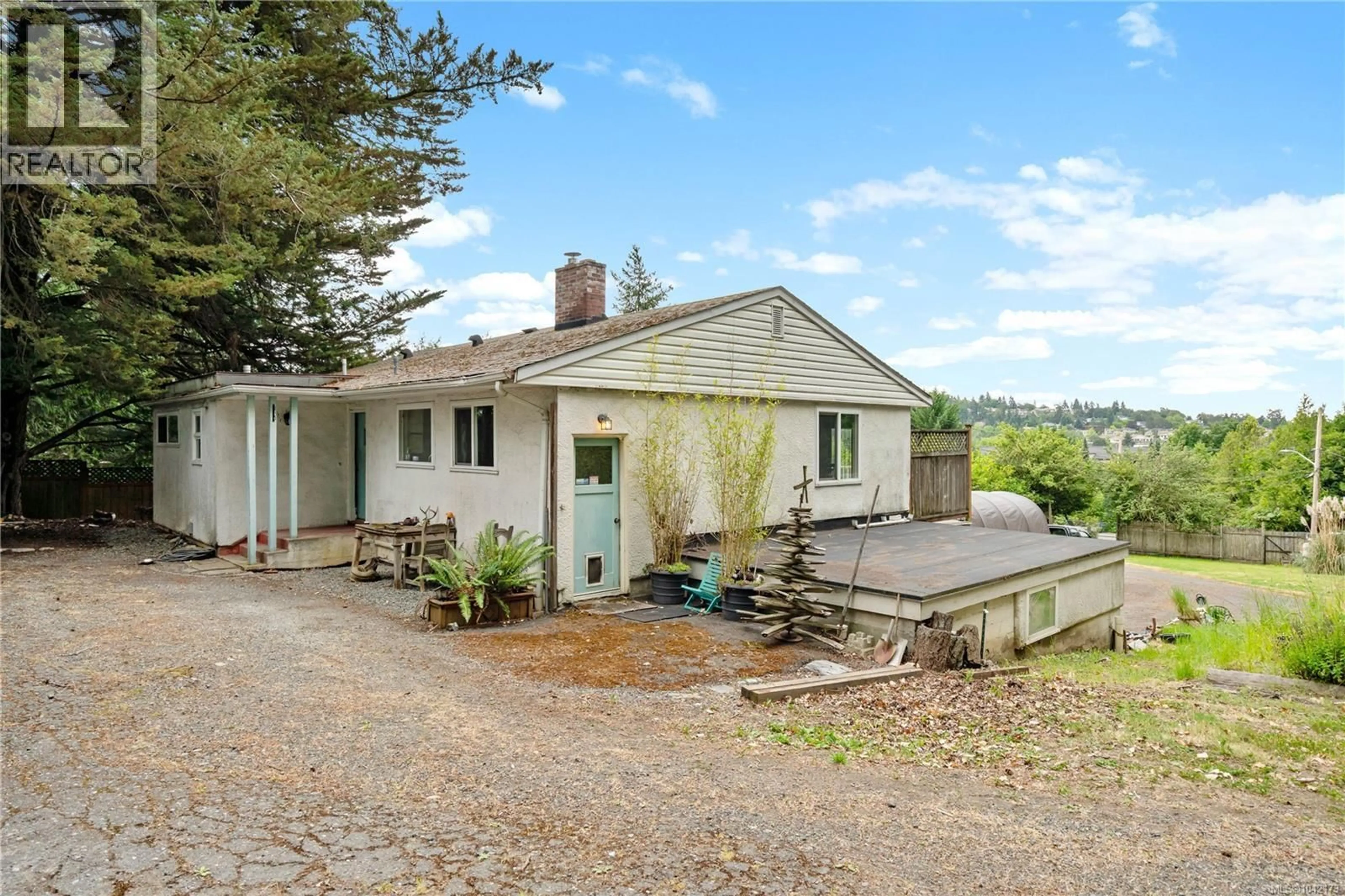 A pic from outside/outdoor area/front of a property/back of a property/a pic from drone, unknown for 4511 PACHENA PLACE, Saanich British Columbia V8X2P1
