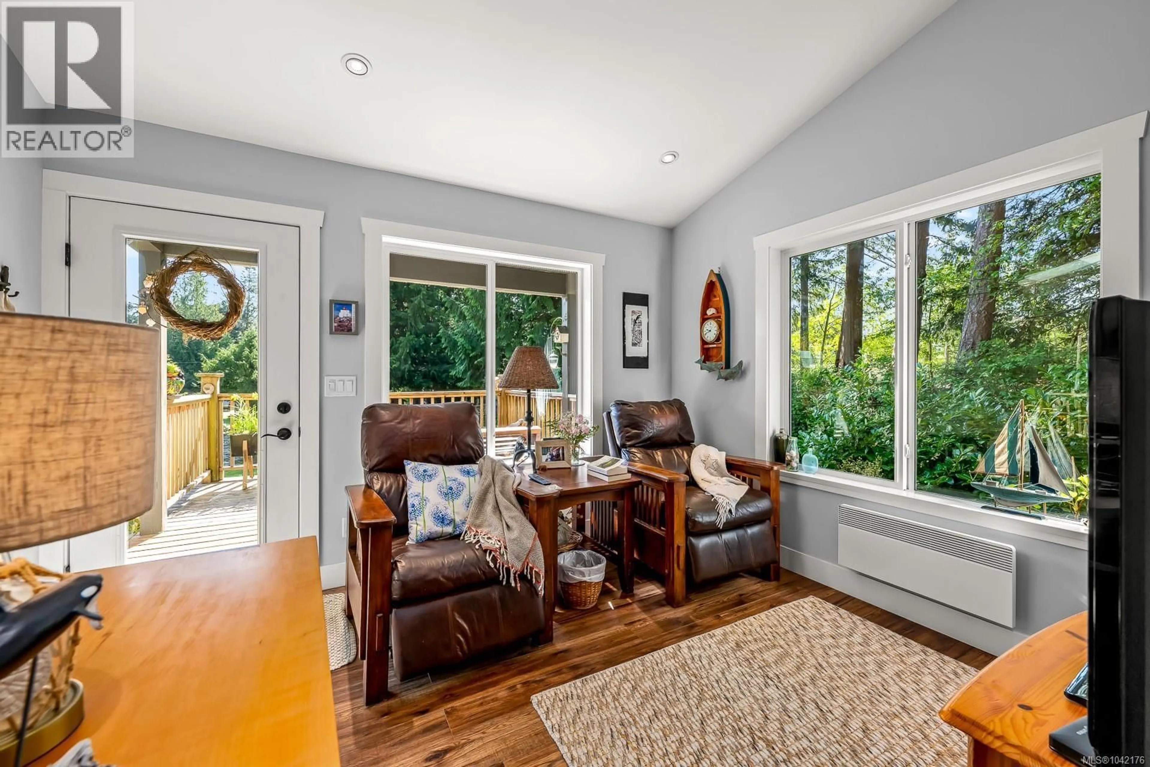 Living room with furniture, unknown for 1495 BAIKIE ROAD, Denman Island British Columbia V0R1T0
