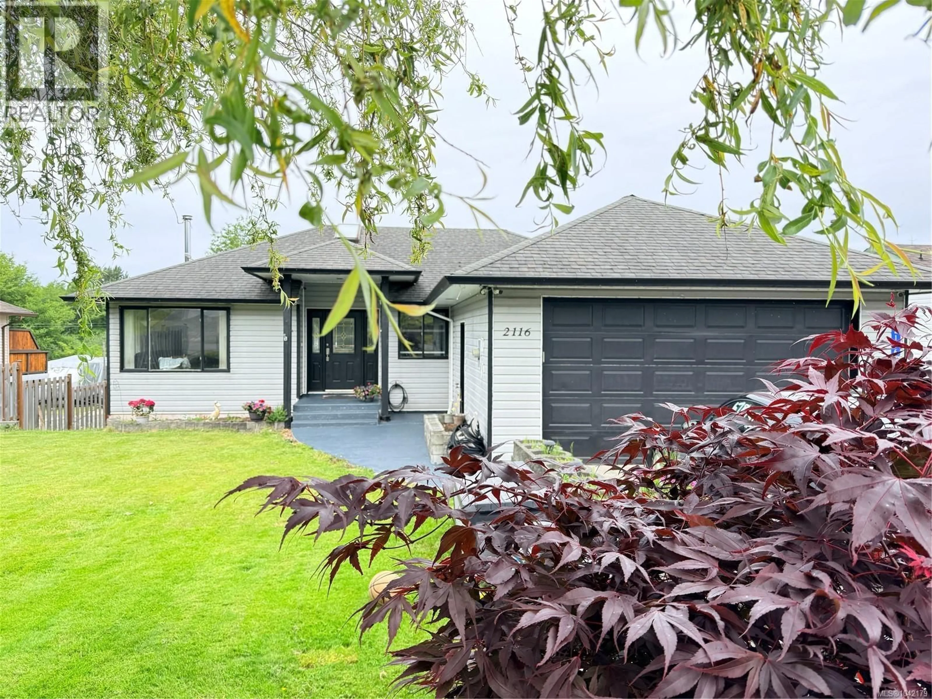 Home with vinyl exterior material, street for 2116 NORTHLAND ROAD, Port McNeill British Columbia V0N2R0