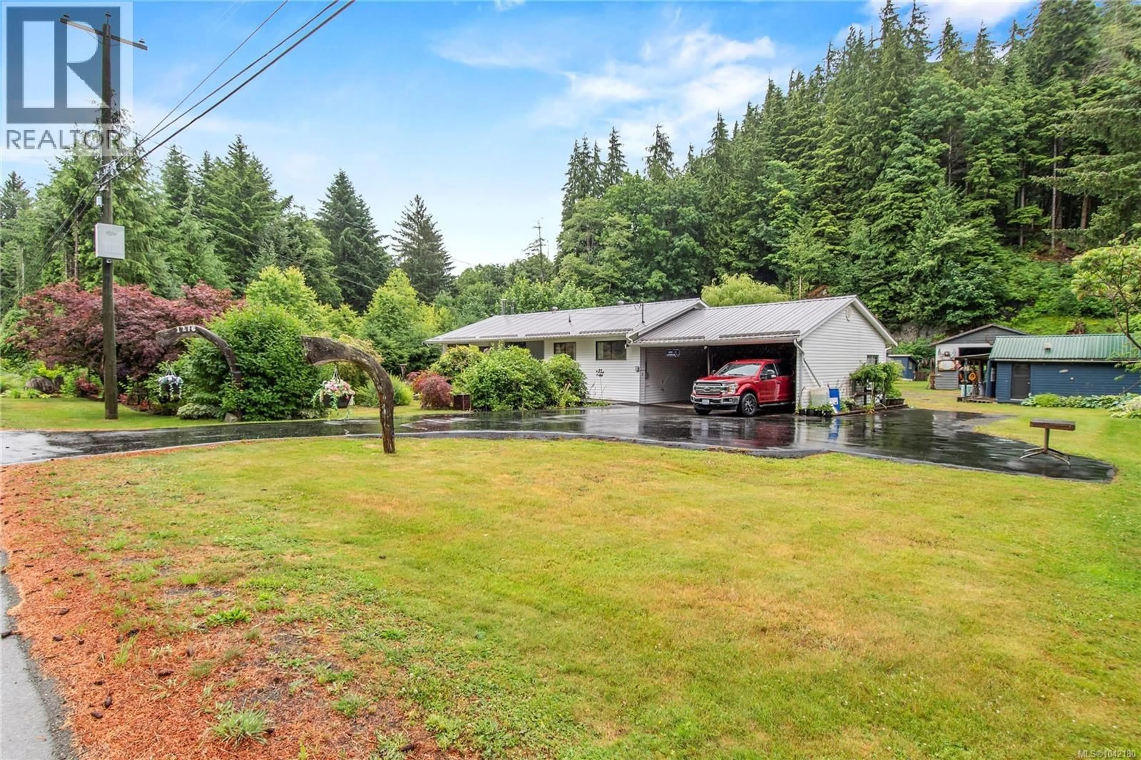 A pic from outside/outdoor area/front of a property/back of a property/a pic from drone, forest/trees view for 1276 SAYWARD ROAD, Sayward British Columbia V0P1R0