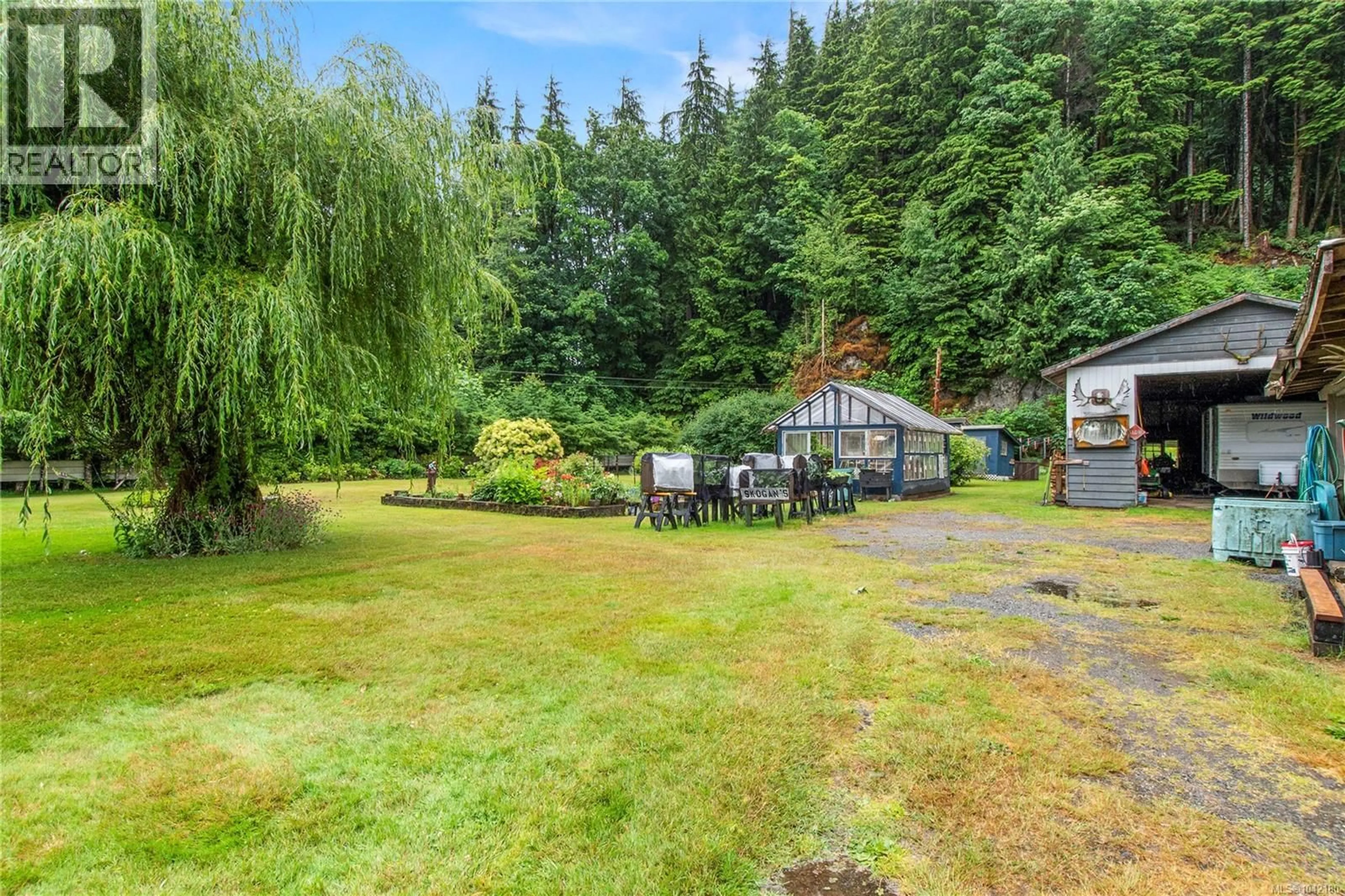 A pic from outside/outdoor area/front of a property/back of a property/a pic from drone, unknown for 1276 SAYWARD ROAD, Sayward British Columbia V0P1R0