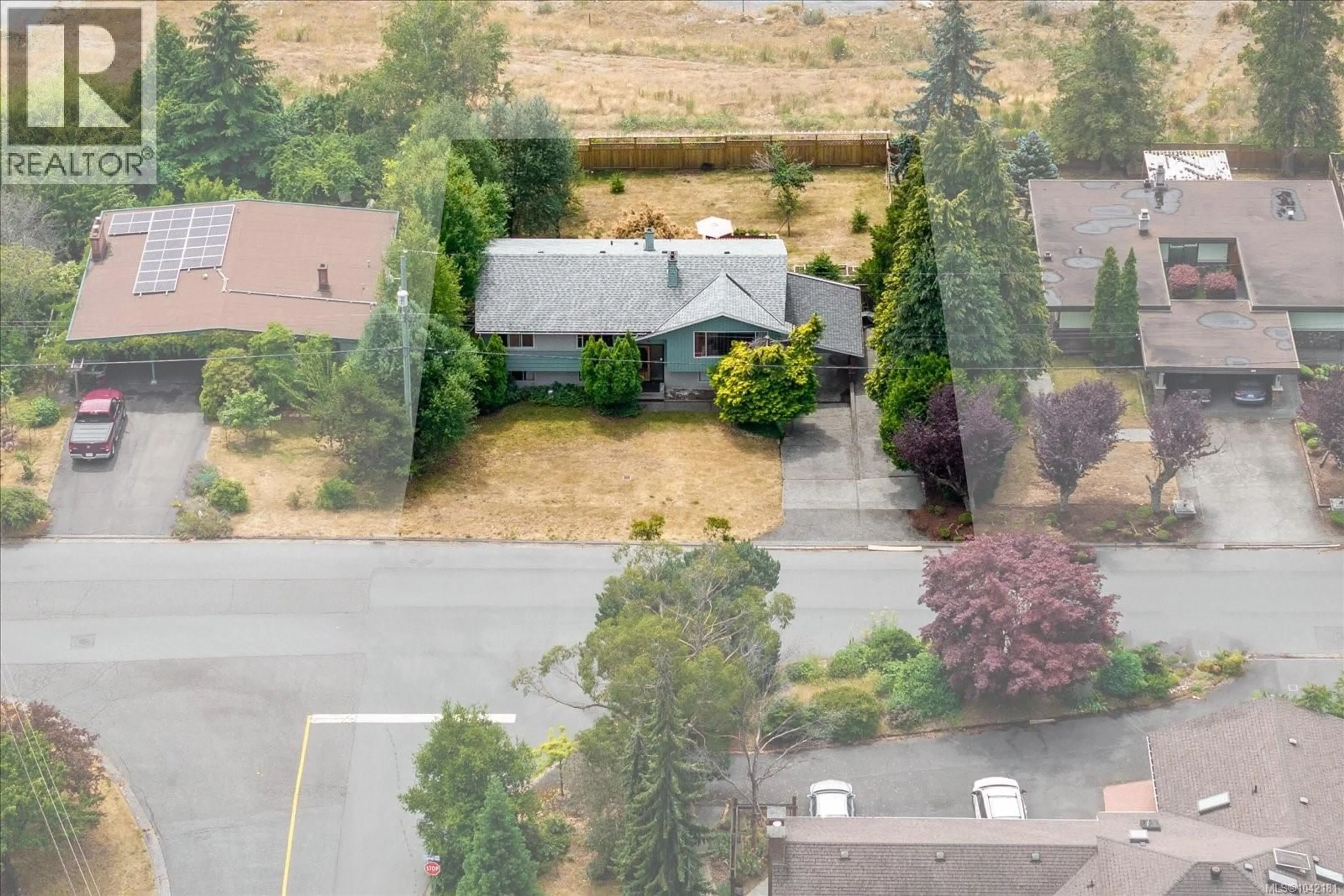A pic from outside/outdoor area/front of a property/back of a property/a pic from drone, unknown for 91 GARNER CRESCENT, Nanaimo British Columbia V9R2A5