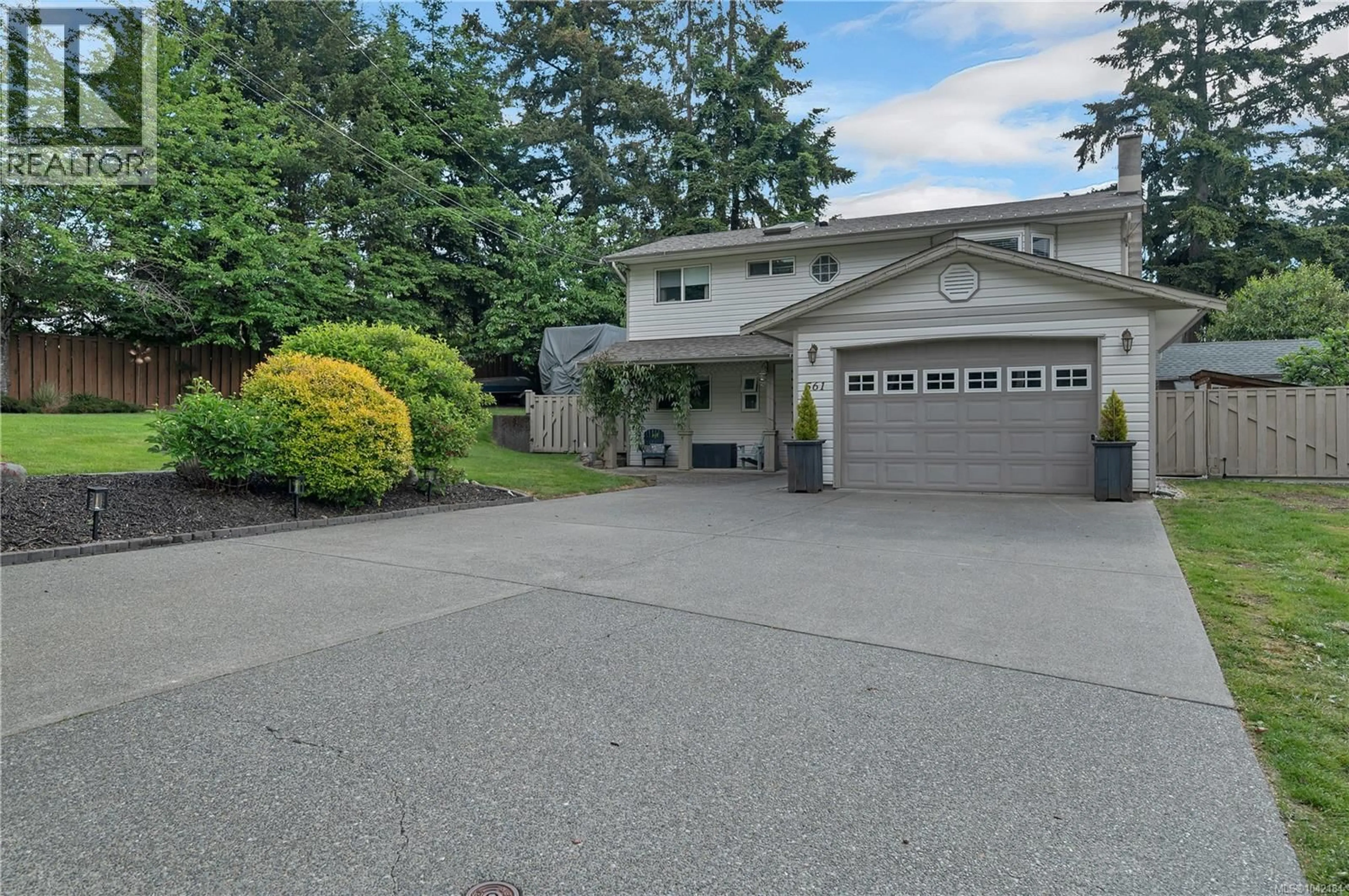 Home with vinyl exterior material, street for 561 BALSAM PLACE, Campbell River British Columbia V9W5S6