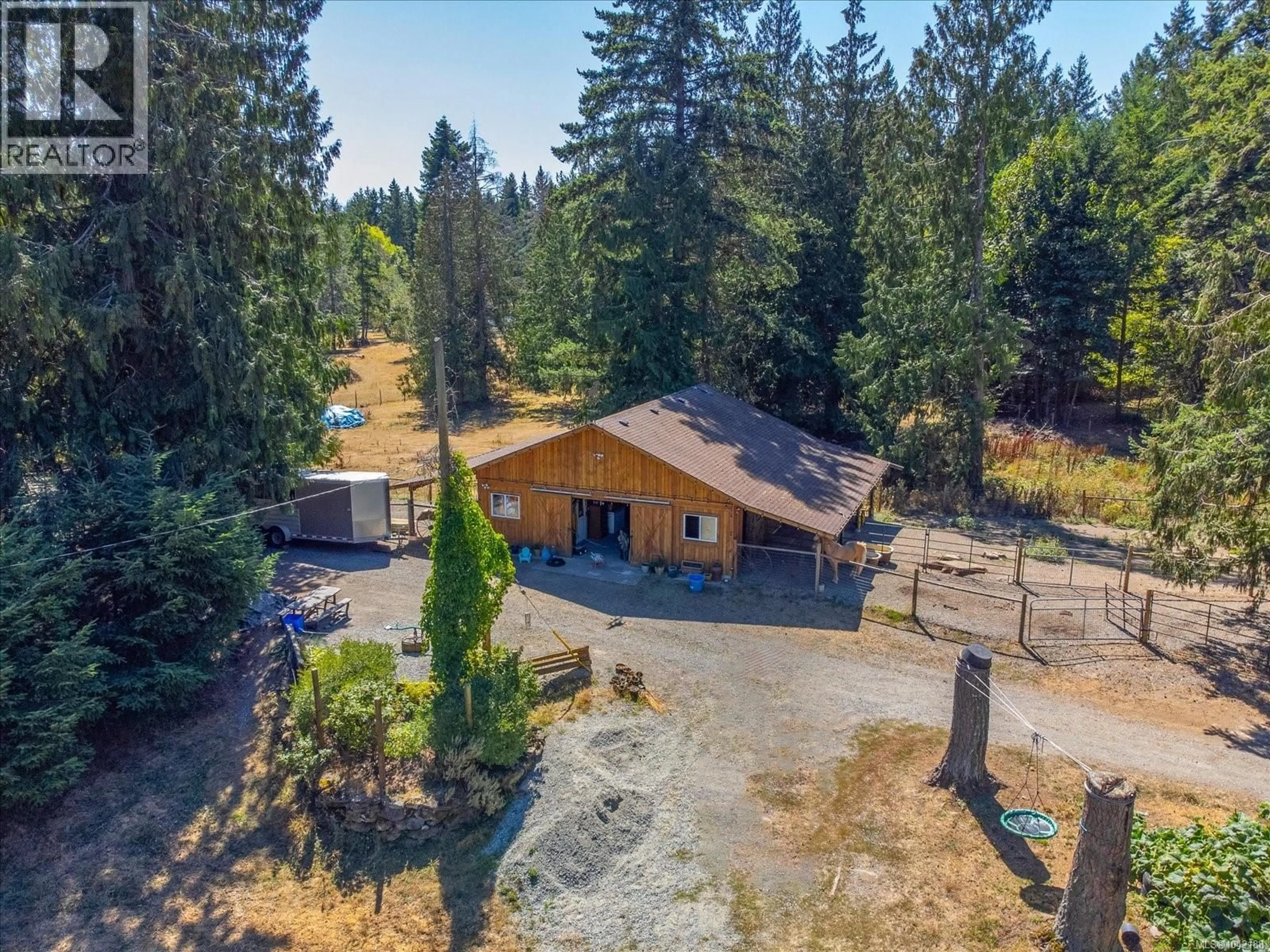 A pic from outside/outdoor area/front of a property/back of a property/a pic from drone, forest/trees view for 3171 DECOURCY DRIVE, Nanaimo British Columbia V9G1E2