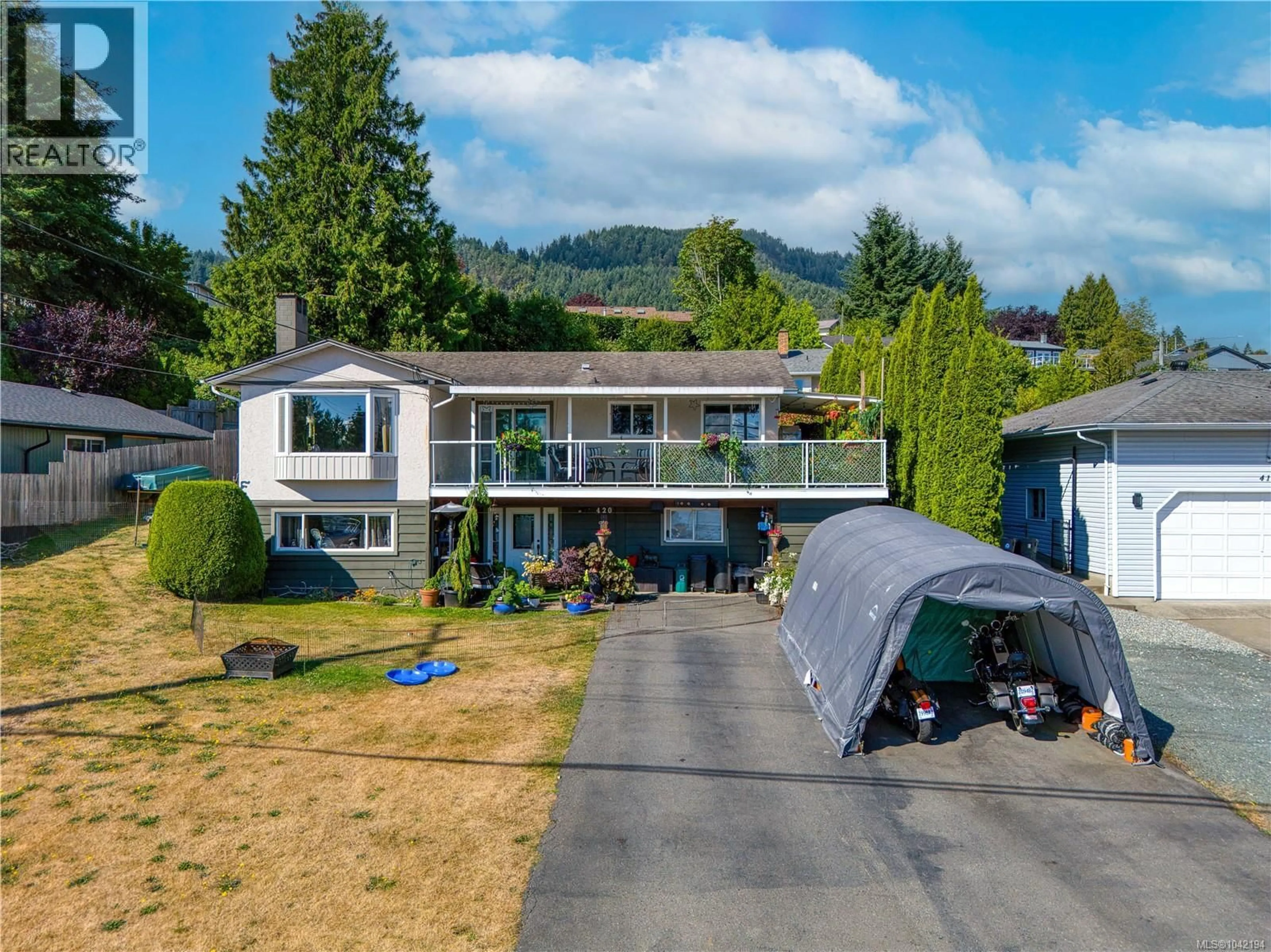 A pic from outside/outdoor area/front of a property/back of a property/a pic from drone, mountain view for 420 STRANG DRIVE, Ladysmith British Columbia V9G1V1