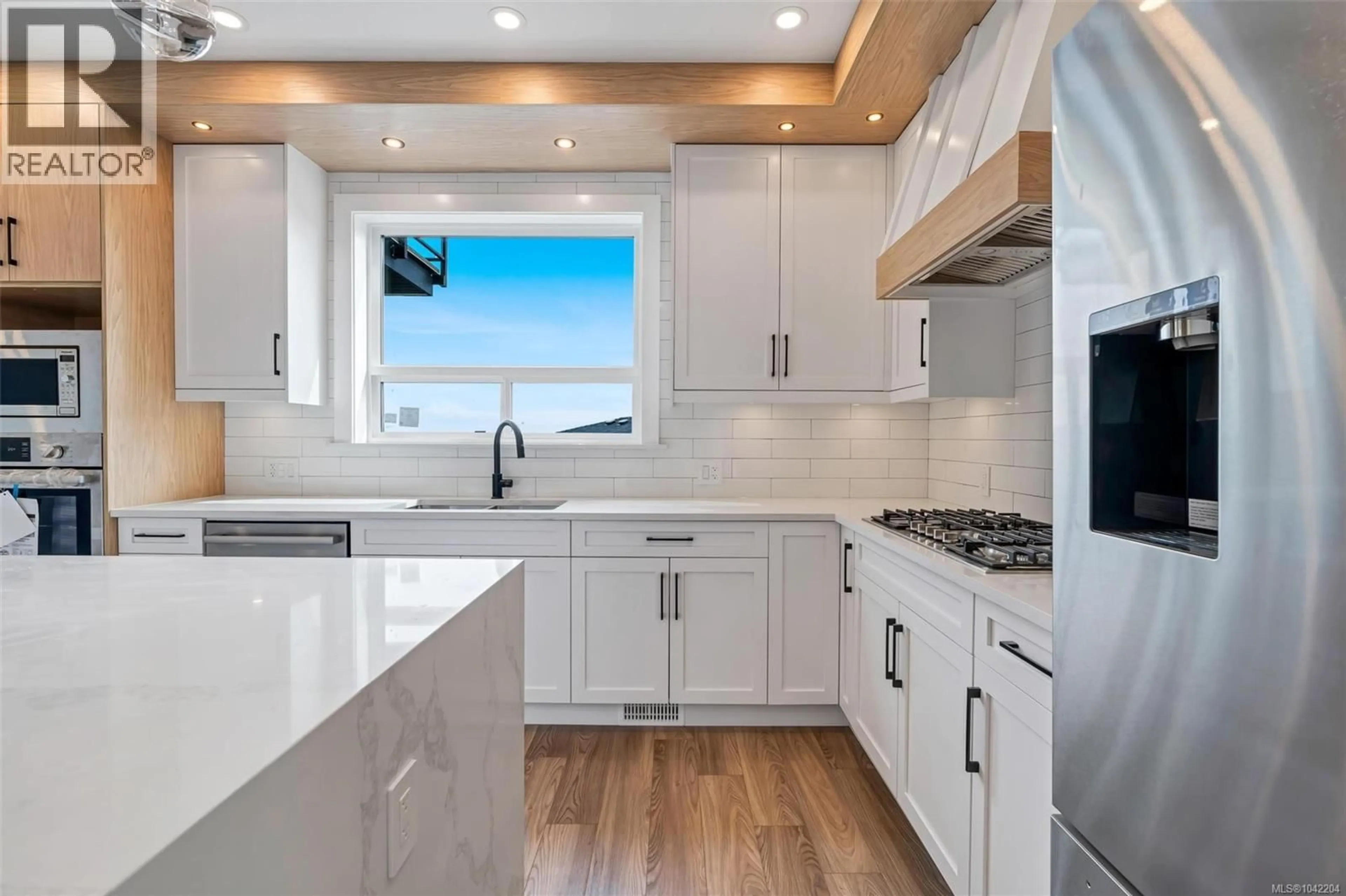 Contemporary kitchen, ceramic/tile floor for 1358 SANDSTONE LANE, Langford British Columbia V9B7A2