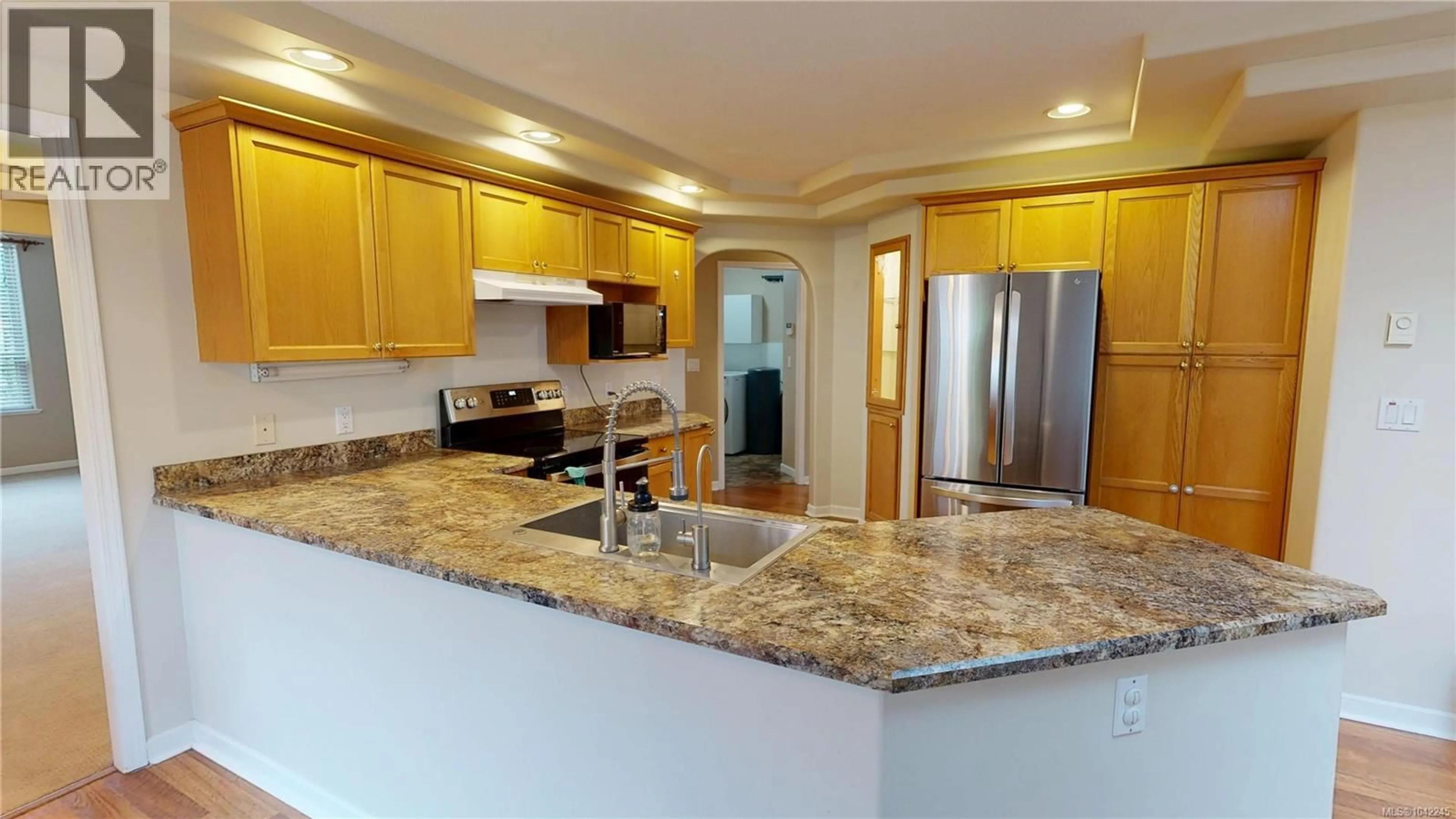 Open concept kitchen, ceramic/tile floor for 1137 YELLOWBRICK ROAD, Parksville British Columbia V9P1K4