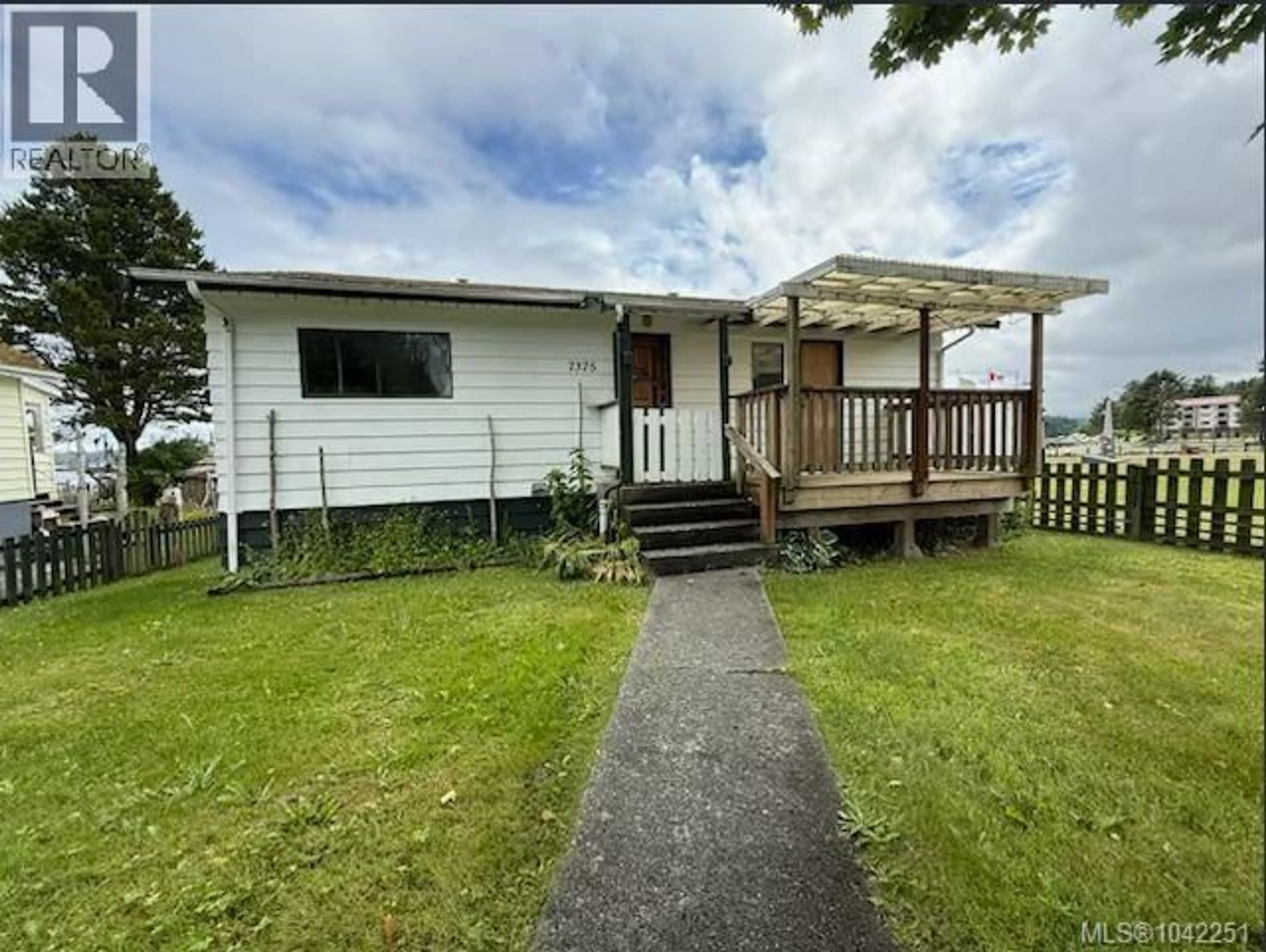 A pic from outside/outdoor area/front of a property/back of a property/a pic from drone, water/lake/river/ocean view for 7375 MARKET STREET, Port Hardy British Columbia V0N2P0