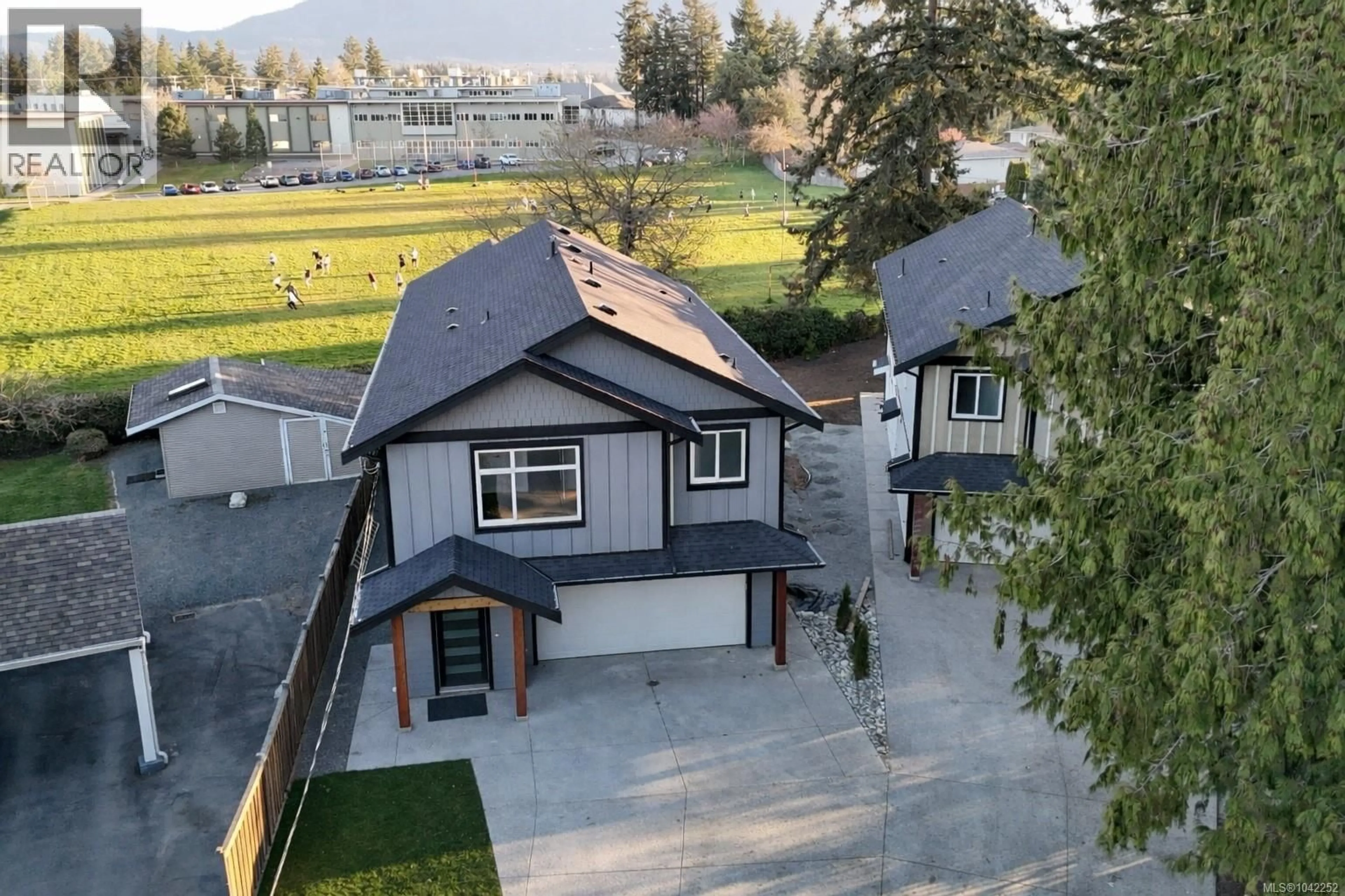 A pic from outside/outdoor area/front of a property/back of a property/a pic from drone, mountain view for 416 DIAMOND BOULEVARD, Nanaimo British Columbia V9T2R7