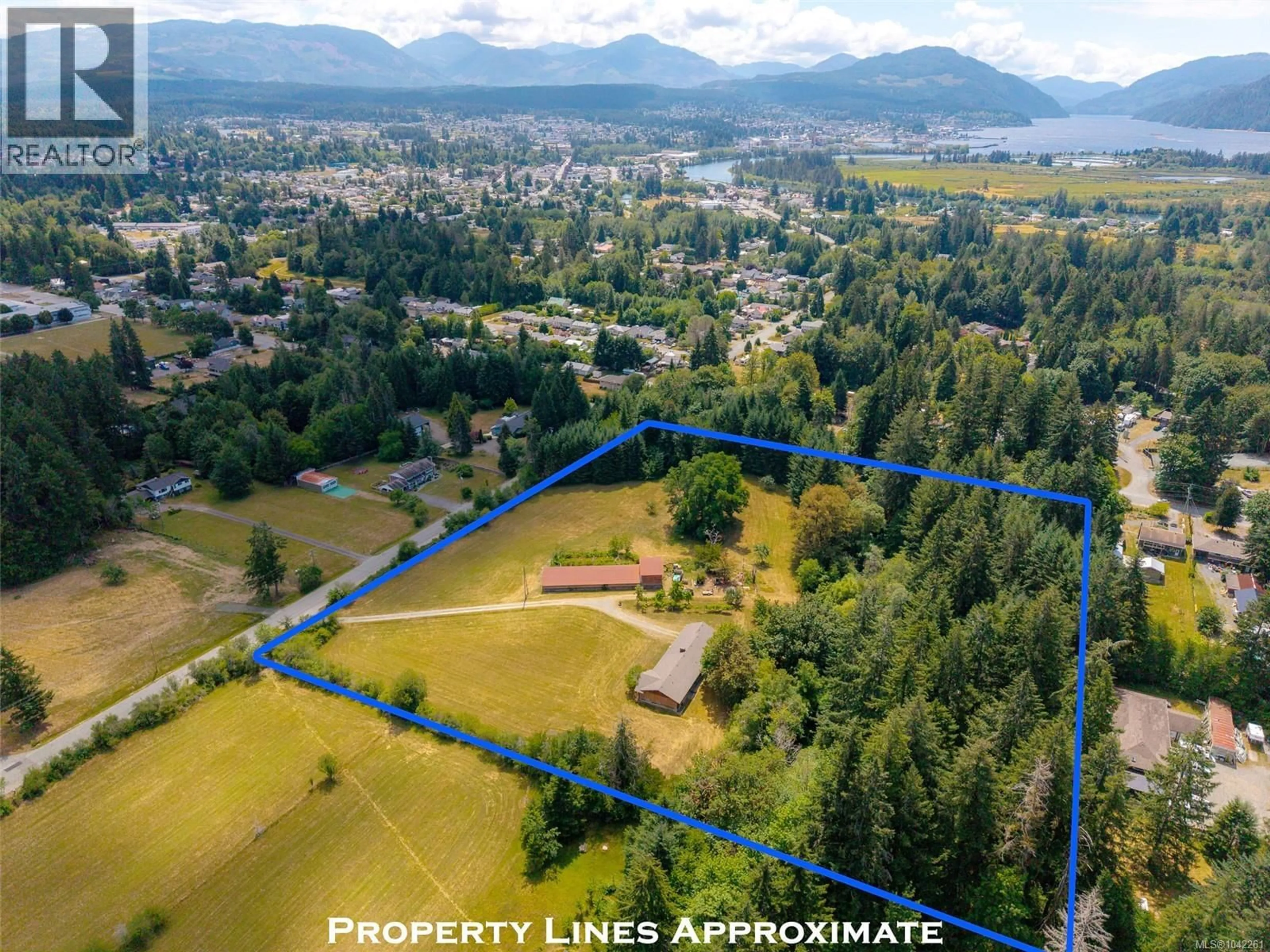 A pic from outside/outdoor area/front of a property/back of a property/a pic from drone, water/lake/river/ocean view for 5526 GRANDVIEW ROAD, Port Alberni British Columbia V9Y8H5