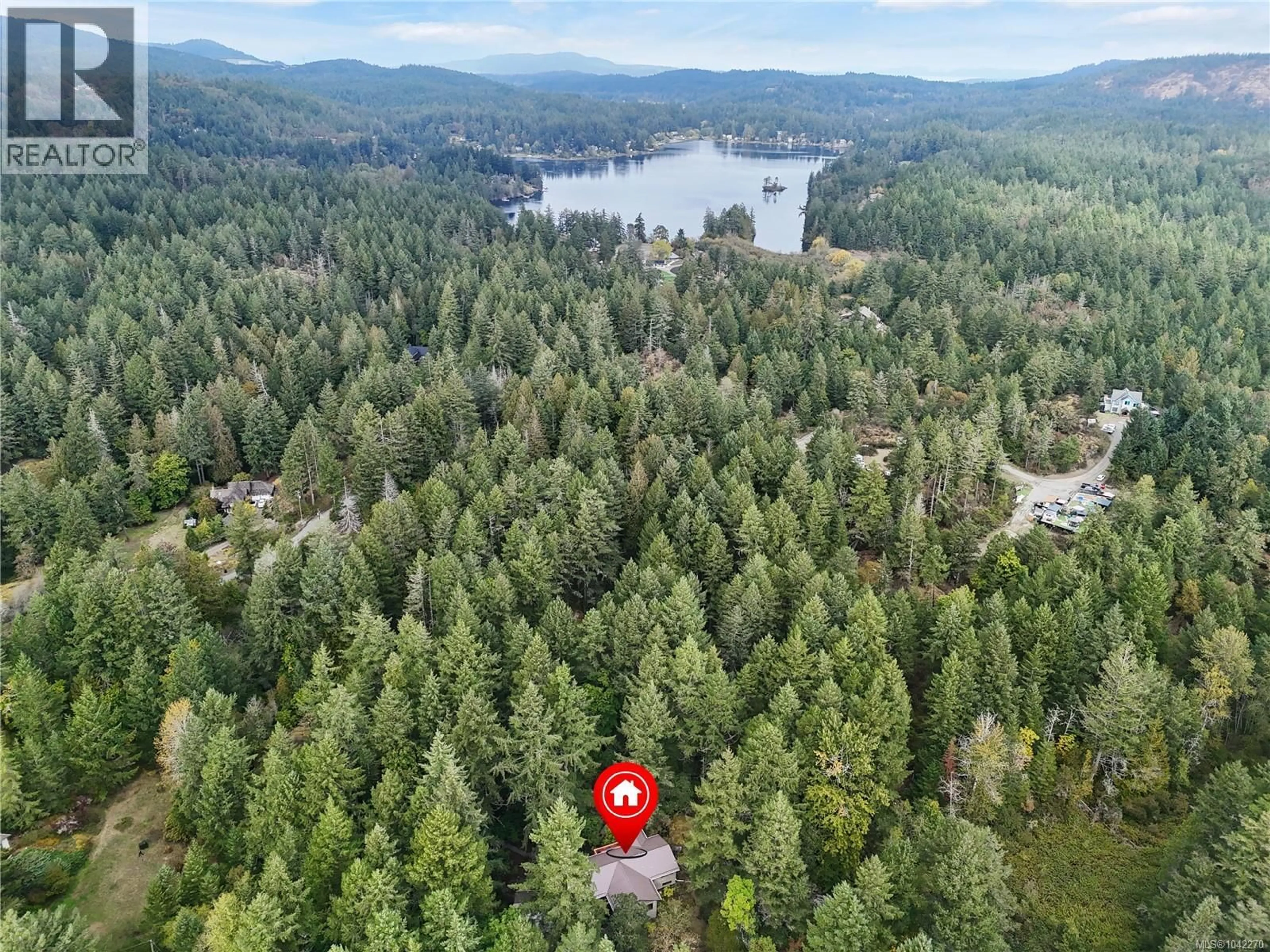 A pic from outside/outdoor area/front of a property/back of a property/a pic from drone, forest/trees view for 100 VIADUCT AVENUE WEST, Saanich British Columbia V9E1J3