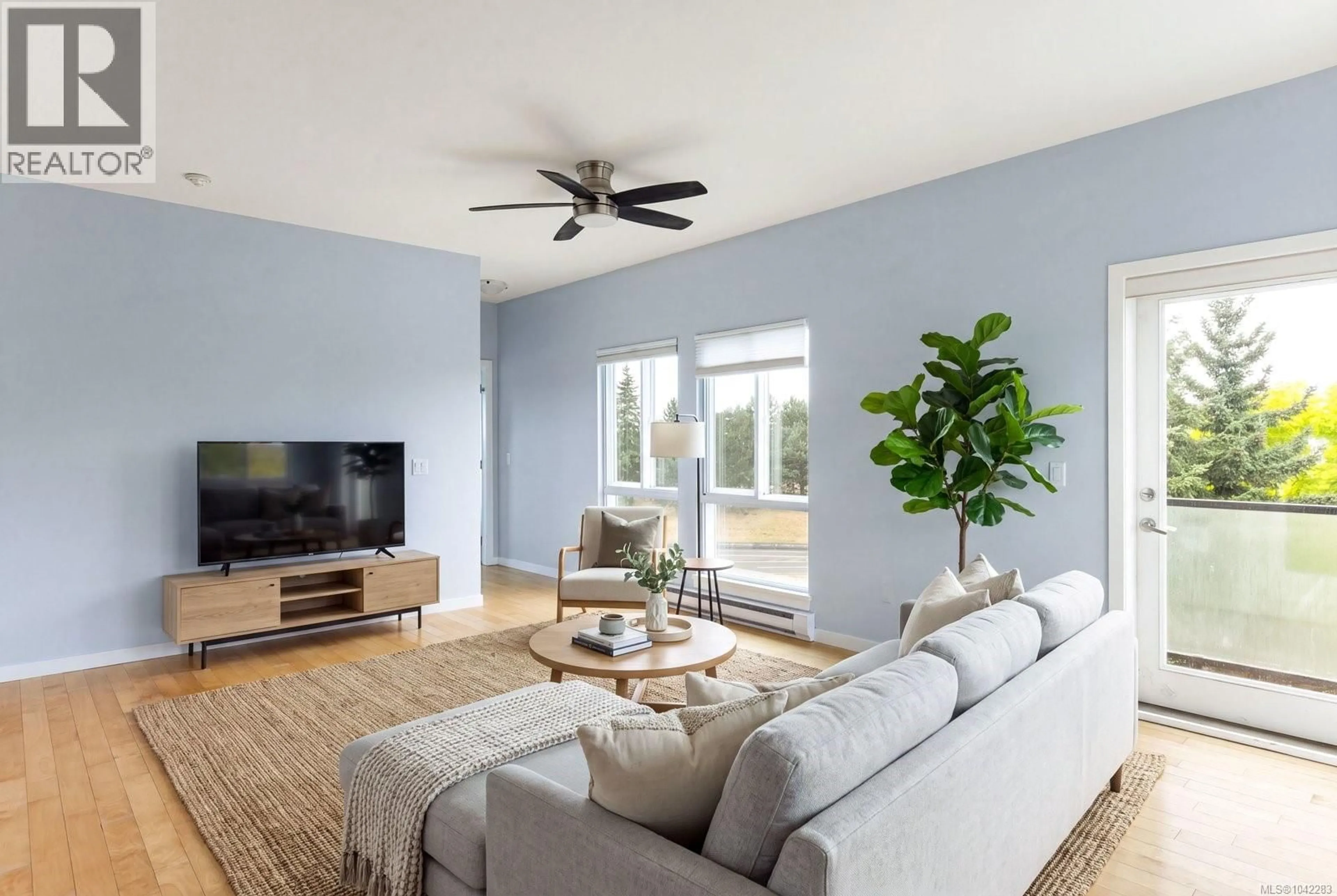 Living room with furniture, unknown for 304 - 4052 DOUGLAS STREET, Saanich British Columbia V8X0A5