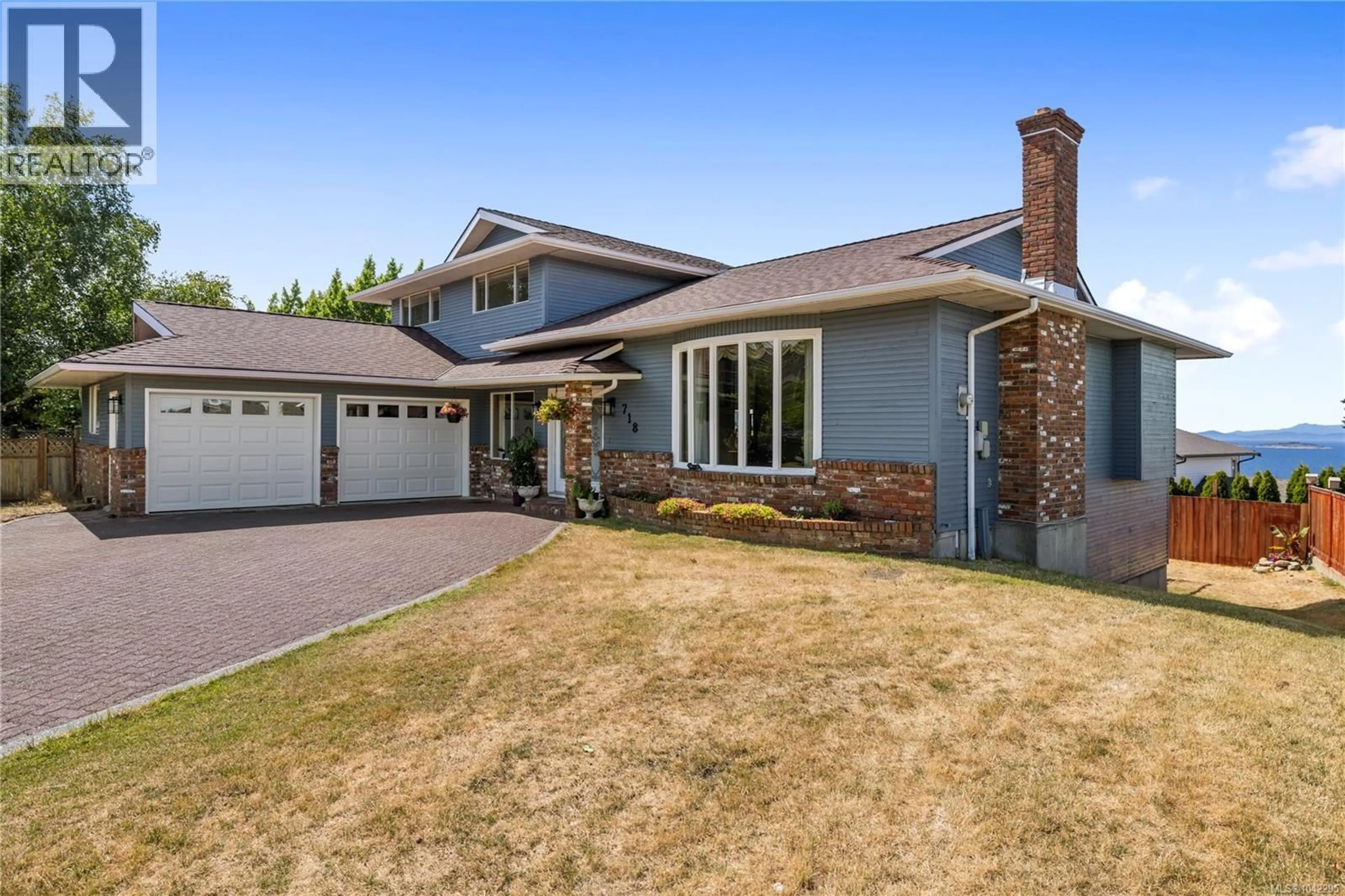 Home with brick exterior material, street for 718 ISLE VIEW PLACE, Nanaimo British Columbia V9V1B4