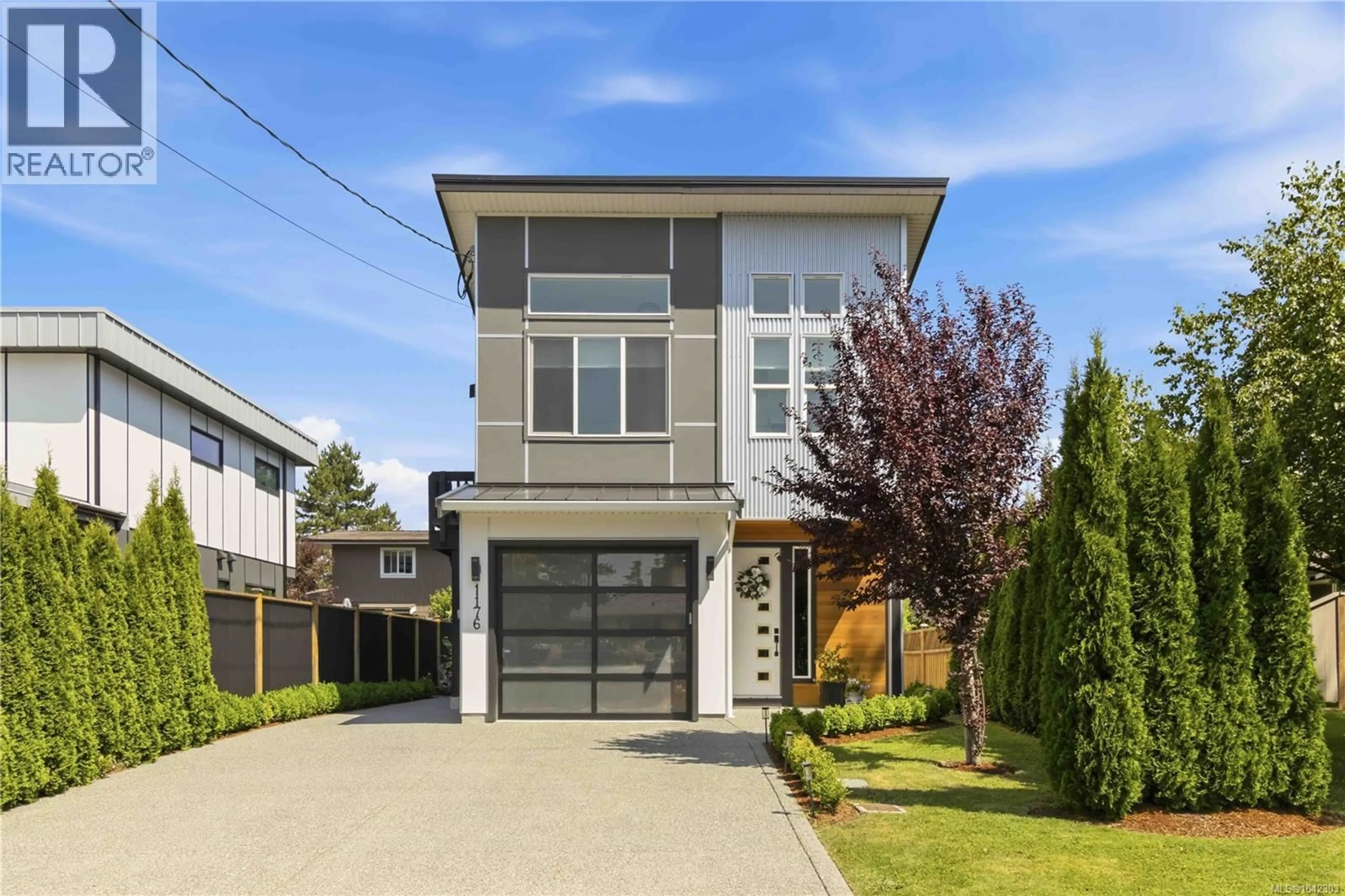 Home with vinyl exterior material, street for 1176 CLARKE ROAD, Central Saanich British Columbia V8M1E3