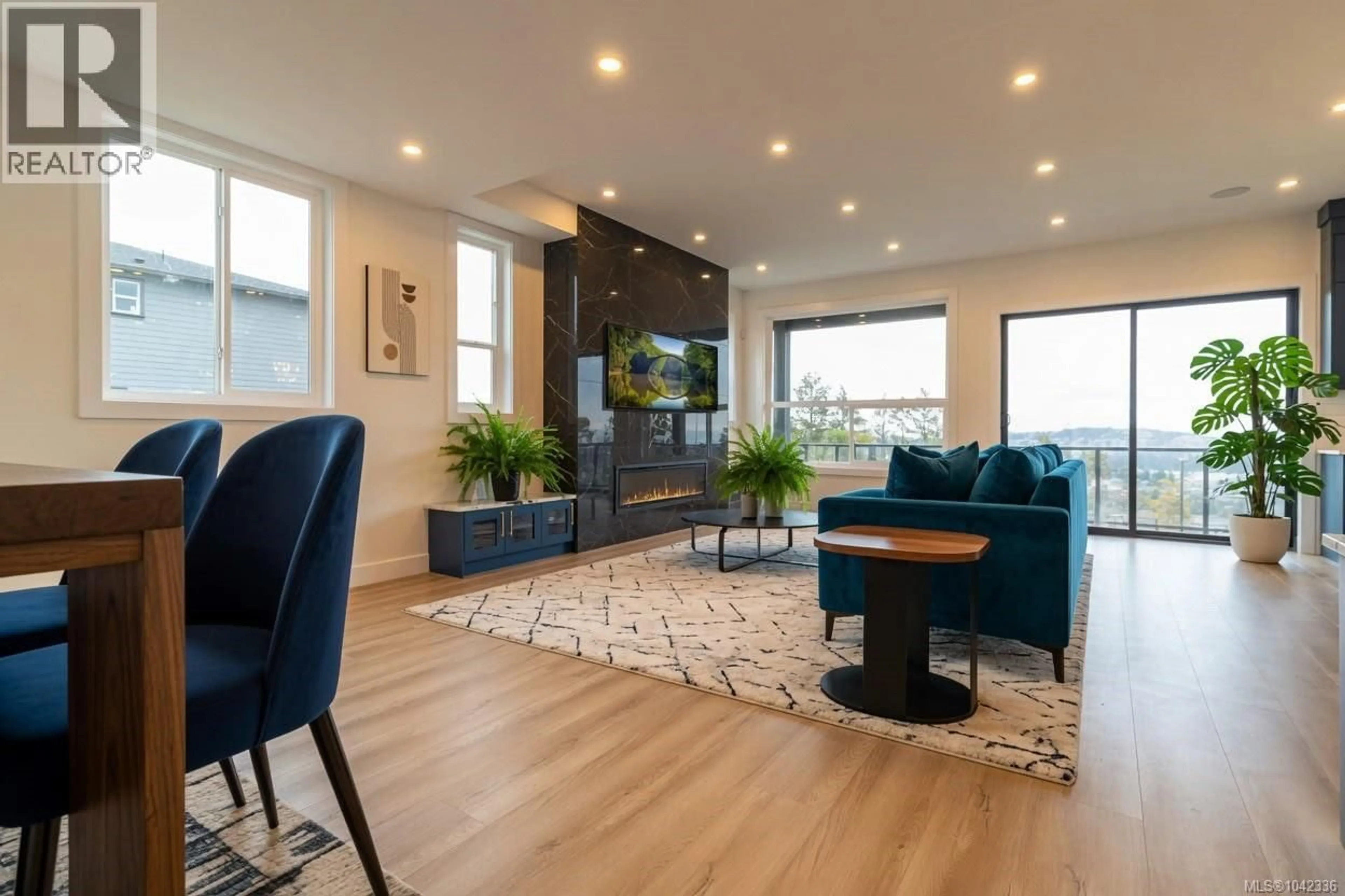 Living room with furniture, wood/laminate floor for 3444 CALDERA COURT, Langford British Columbia V9B6Z8