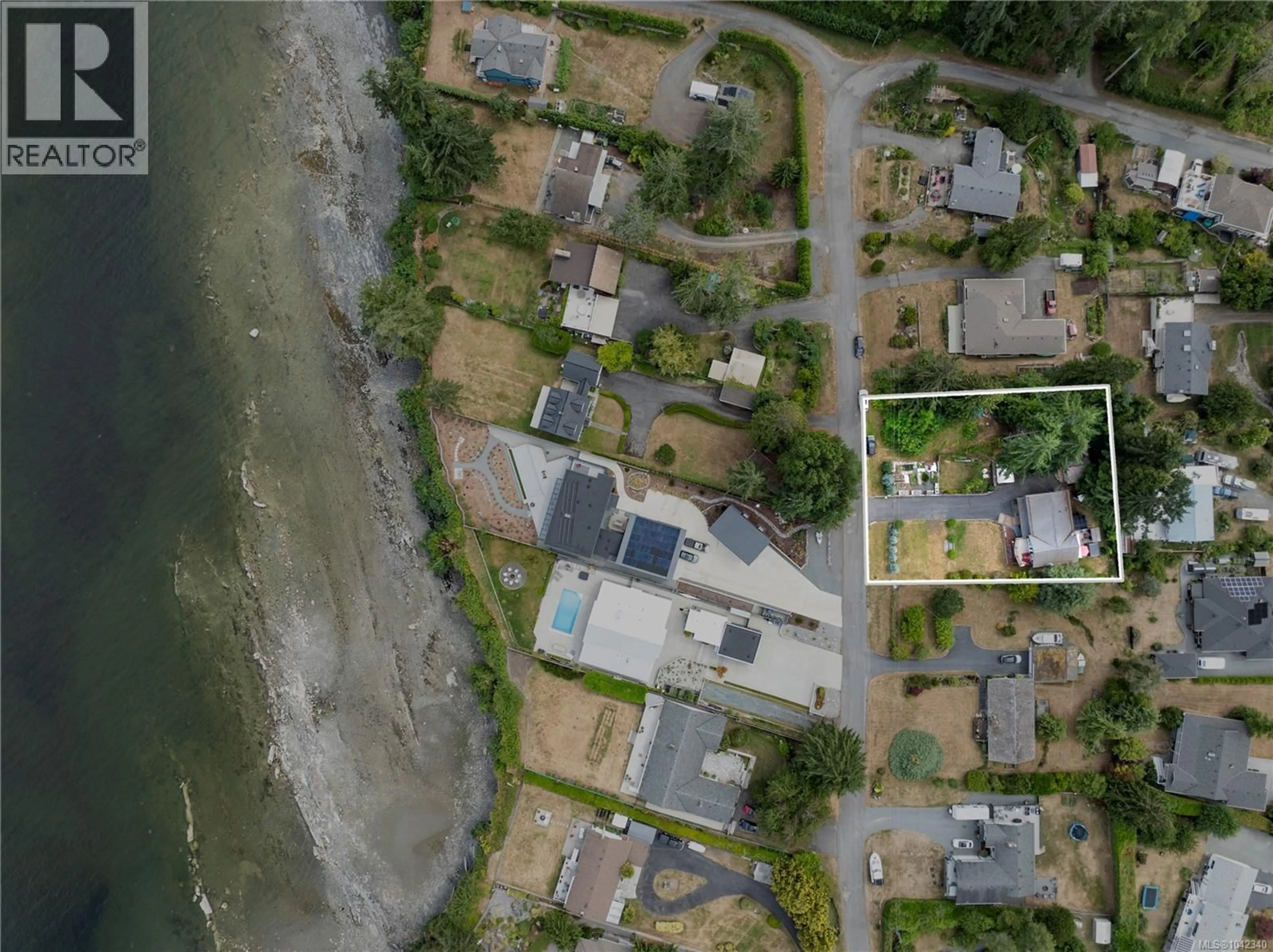 A pic from outside/outdoor area/front of a property/back of a property/a pic from drone, water/lake/river/ocean view for 1671 FAWCETT ROAD, Nanaimo British Columbia V9X1P2