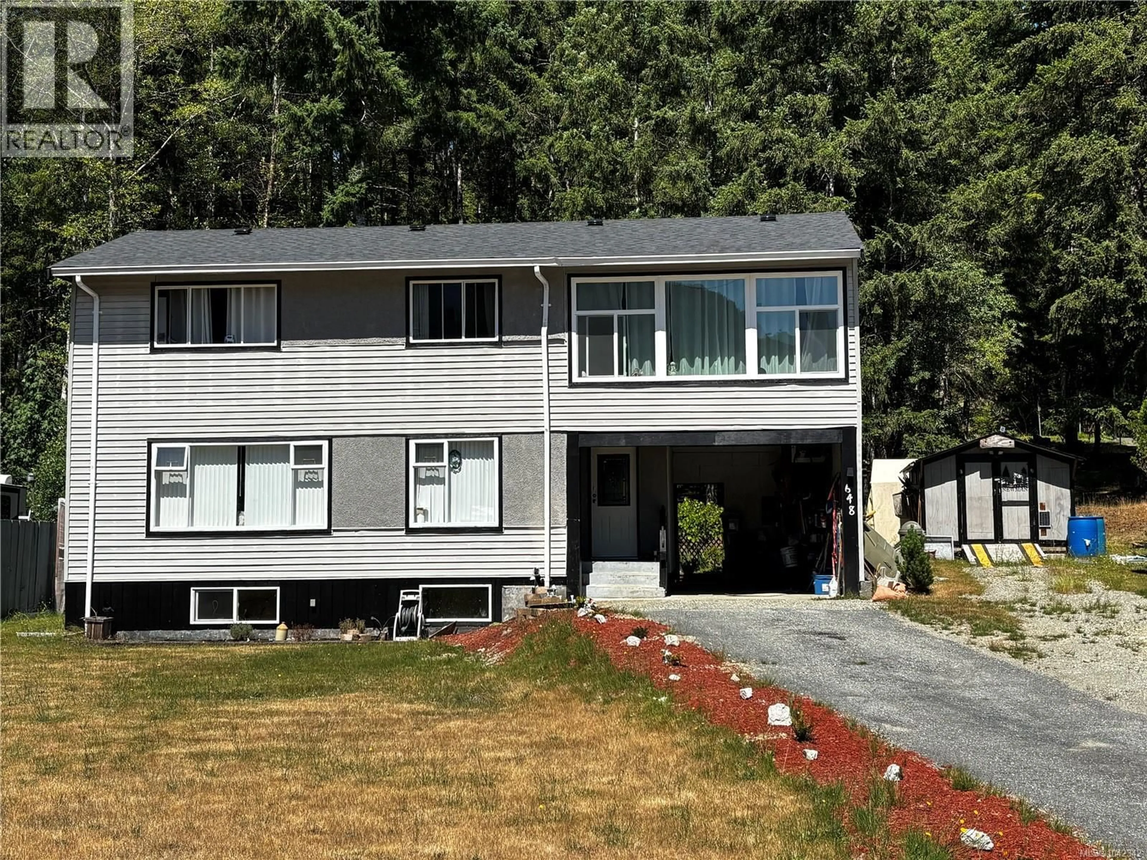 Home with vinyl exterior material, street for 648 NIMPKISH DRIVE, Gold River British Columbia V0P1G0