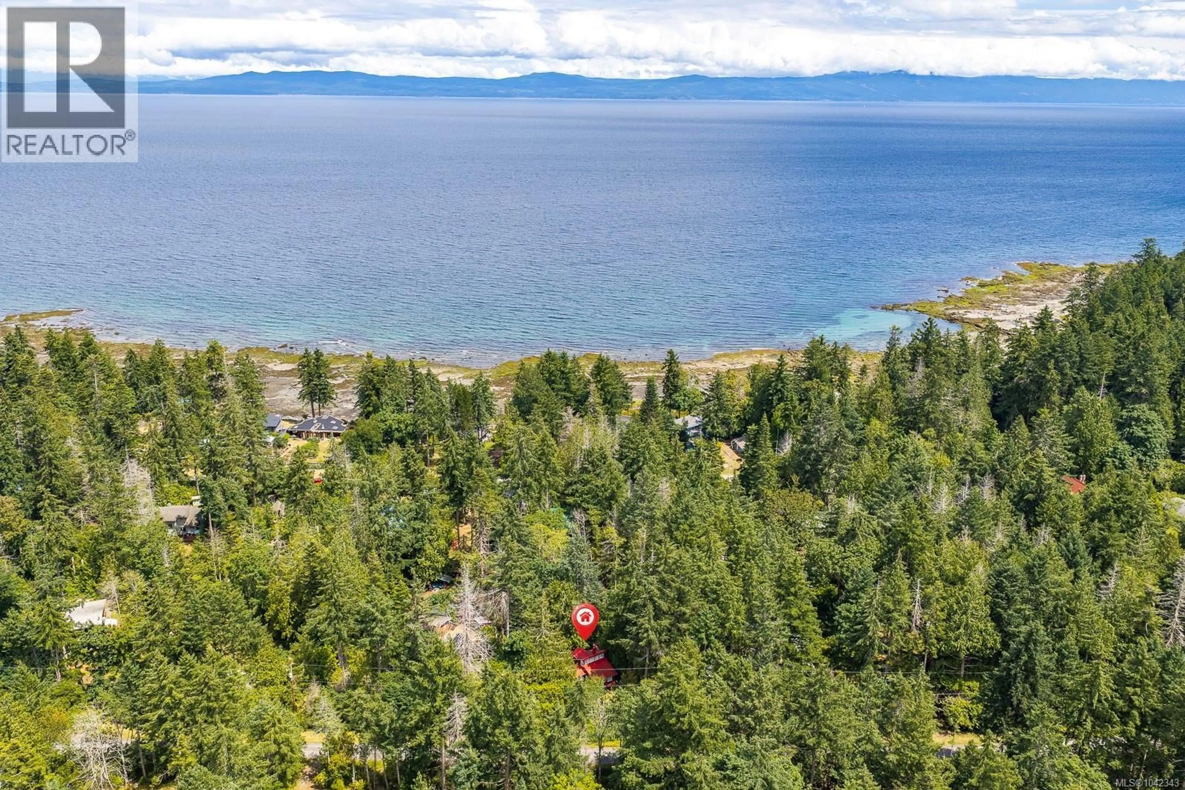 A pic from outside/outdoor area/front of a property/back of a property/a pic from drone, water/lake/river/ocean view for 3465 BRIGANTINE CRESCENT, Hornby Island British Columbia V0R1Z0