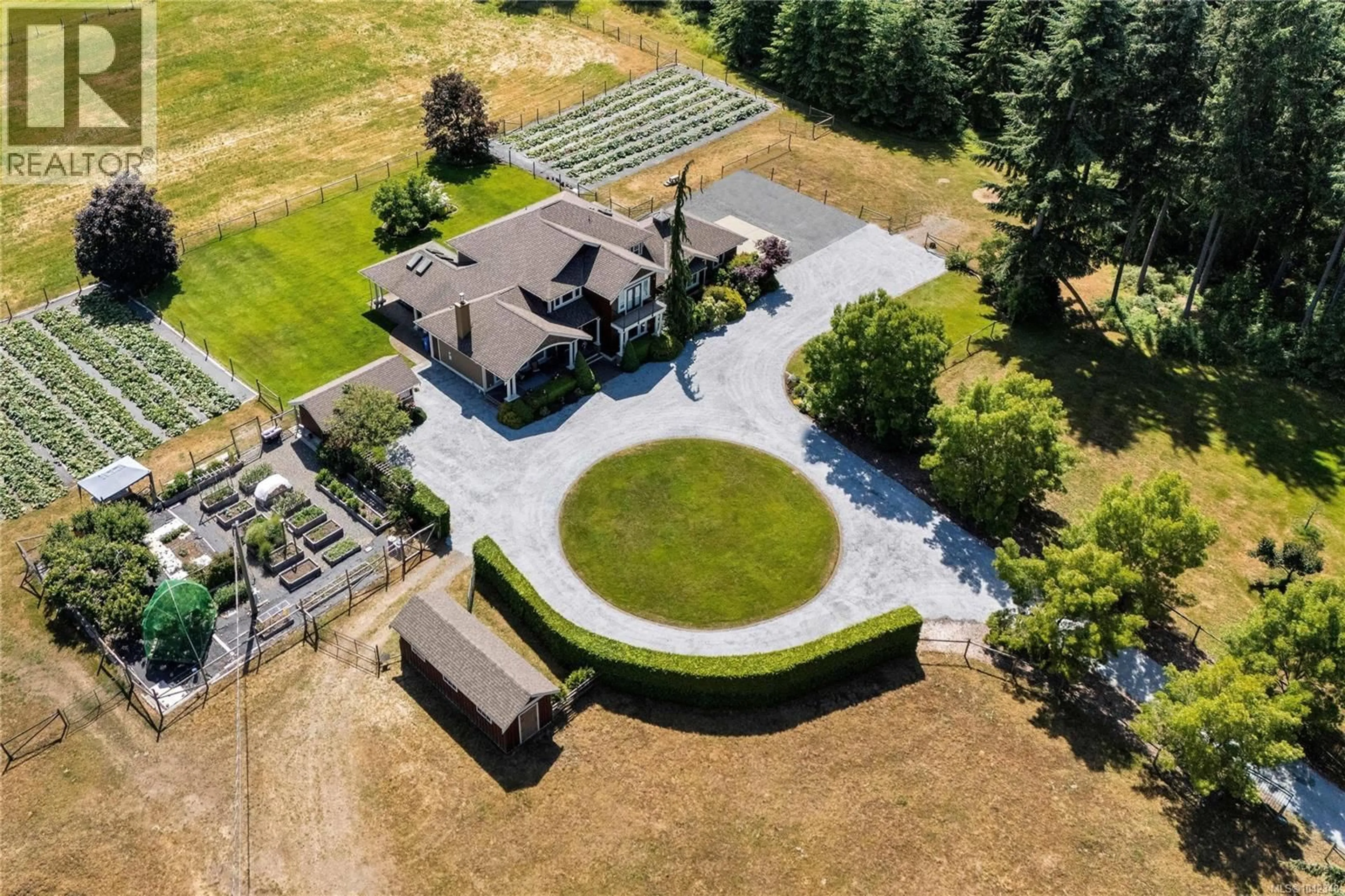 A pic from outside/outdoor area/front of a property/back of a property/a pic from drone, mountain view for 1848 MYHREST ROAD, Cowichan Bay British Columbia V0R1N1