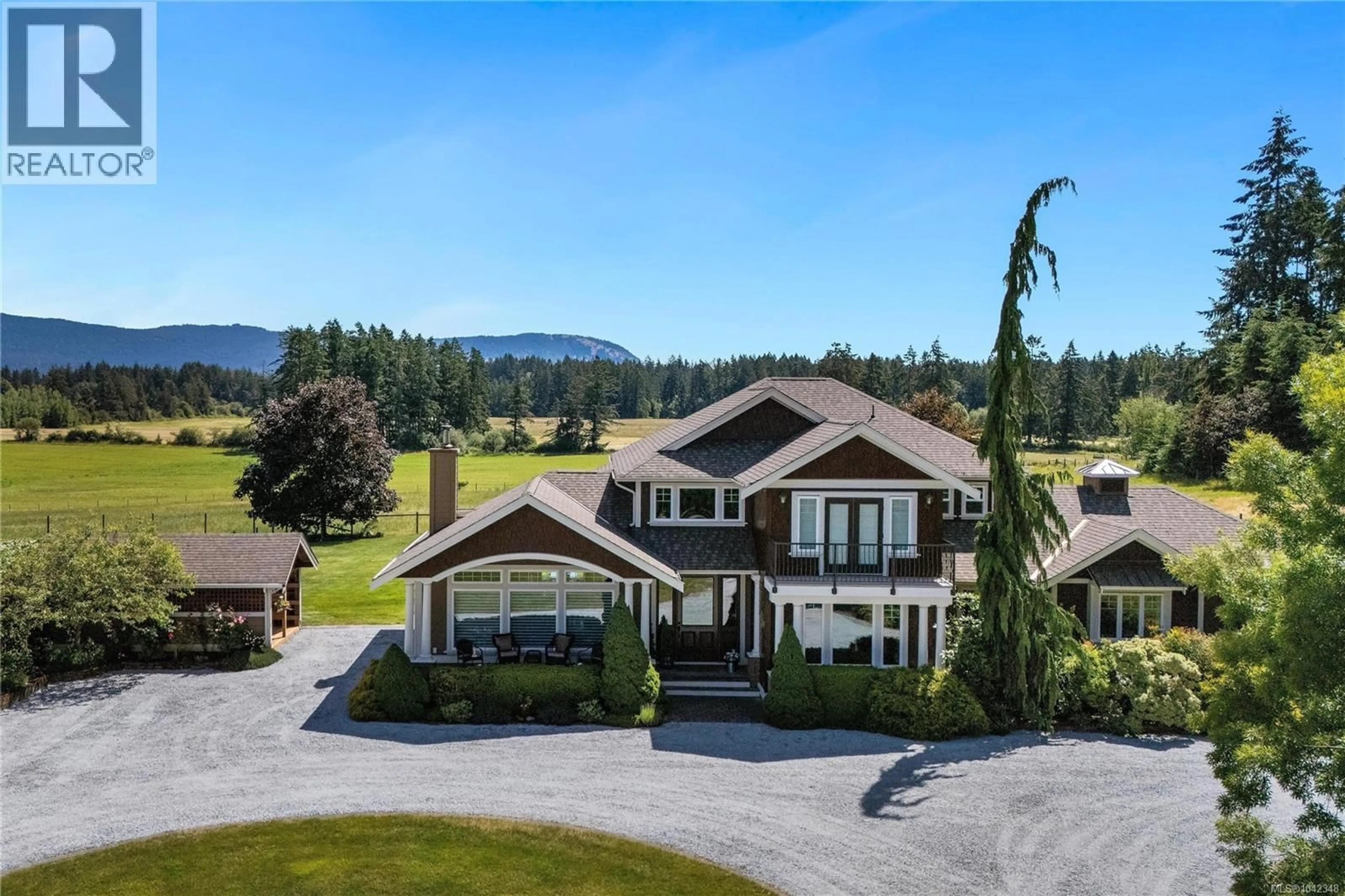A pic from outside/outdoor area/front of a property/back of a property/a pic from drone, mountain view for 1848 MYHREST ROAD, Cowichan Bay British Columbia V0R1N1