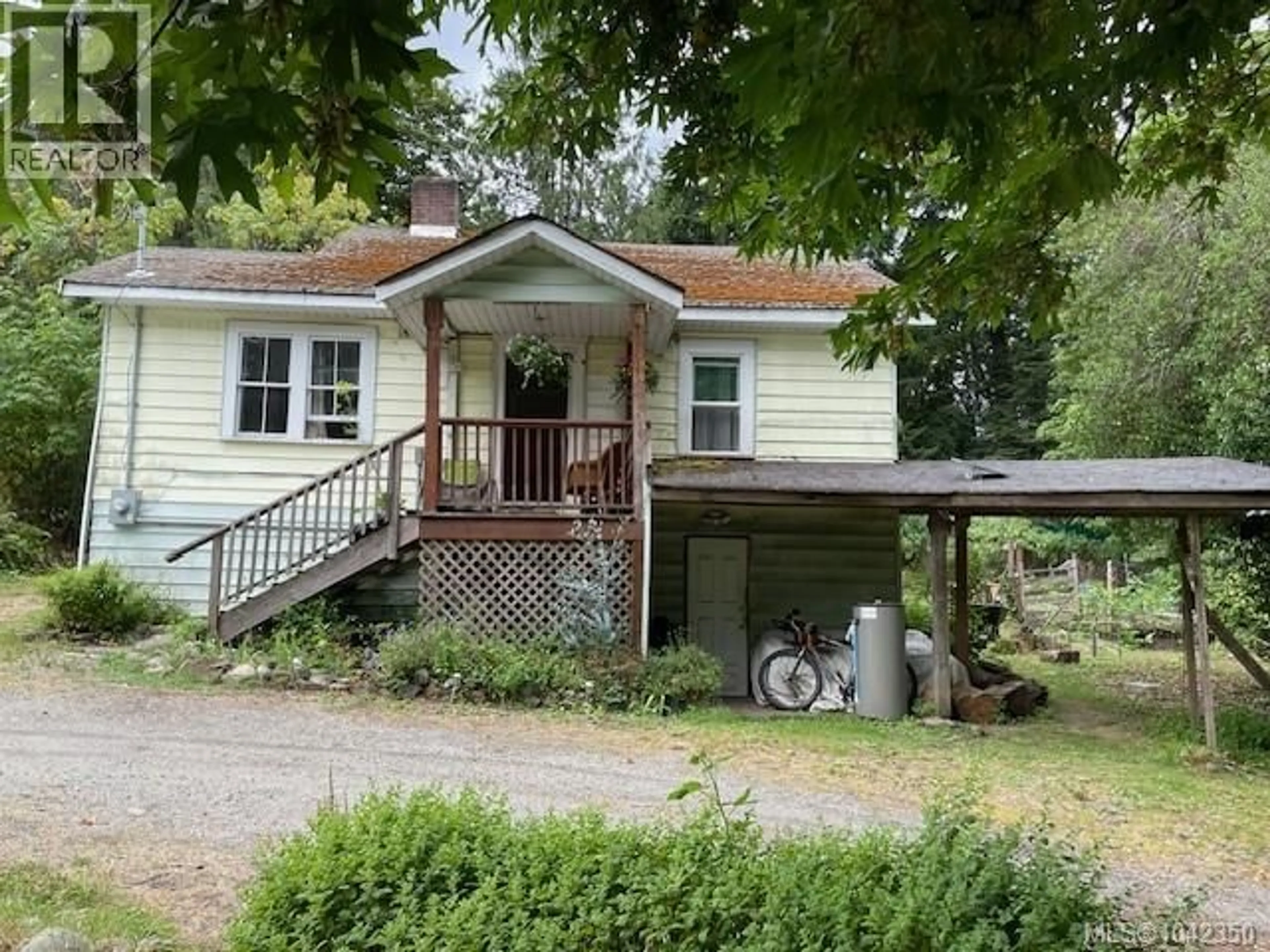 A pic from outside/outdoor area/front of a property/back of a property/a pic from drone, street for 220 FULFORD-GANGES ROAD, Salt Spring British Columbia V8K2K7