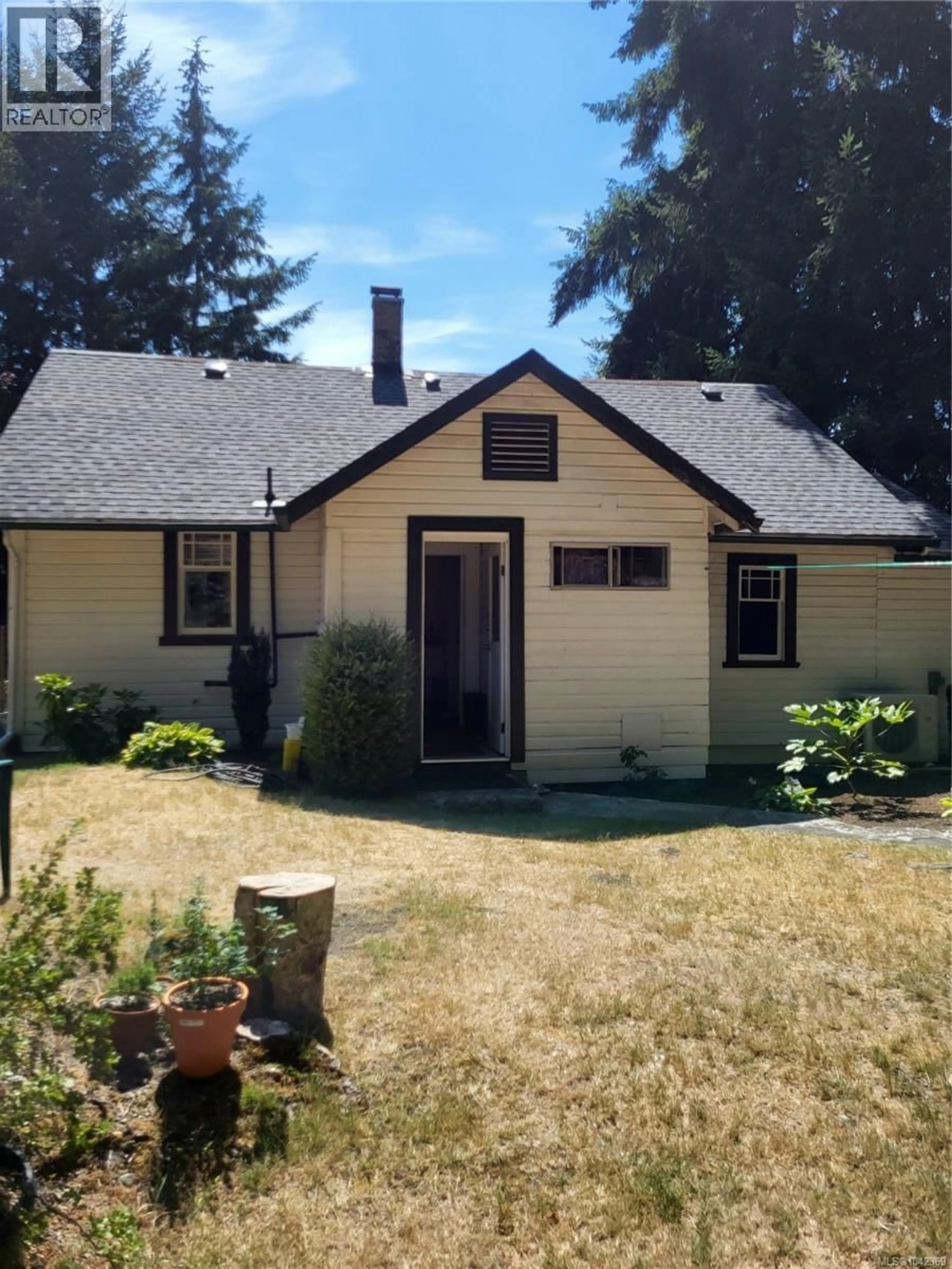 Home with vinyl exterior material, street for 10511 YOUBOU ROAD, Youbou British Columbia V0R3E1