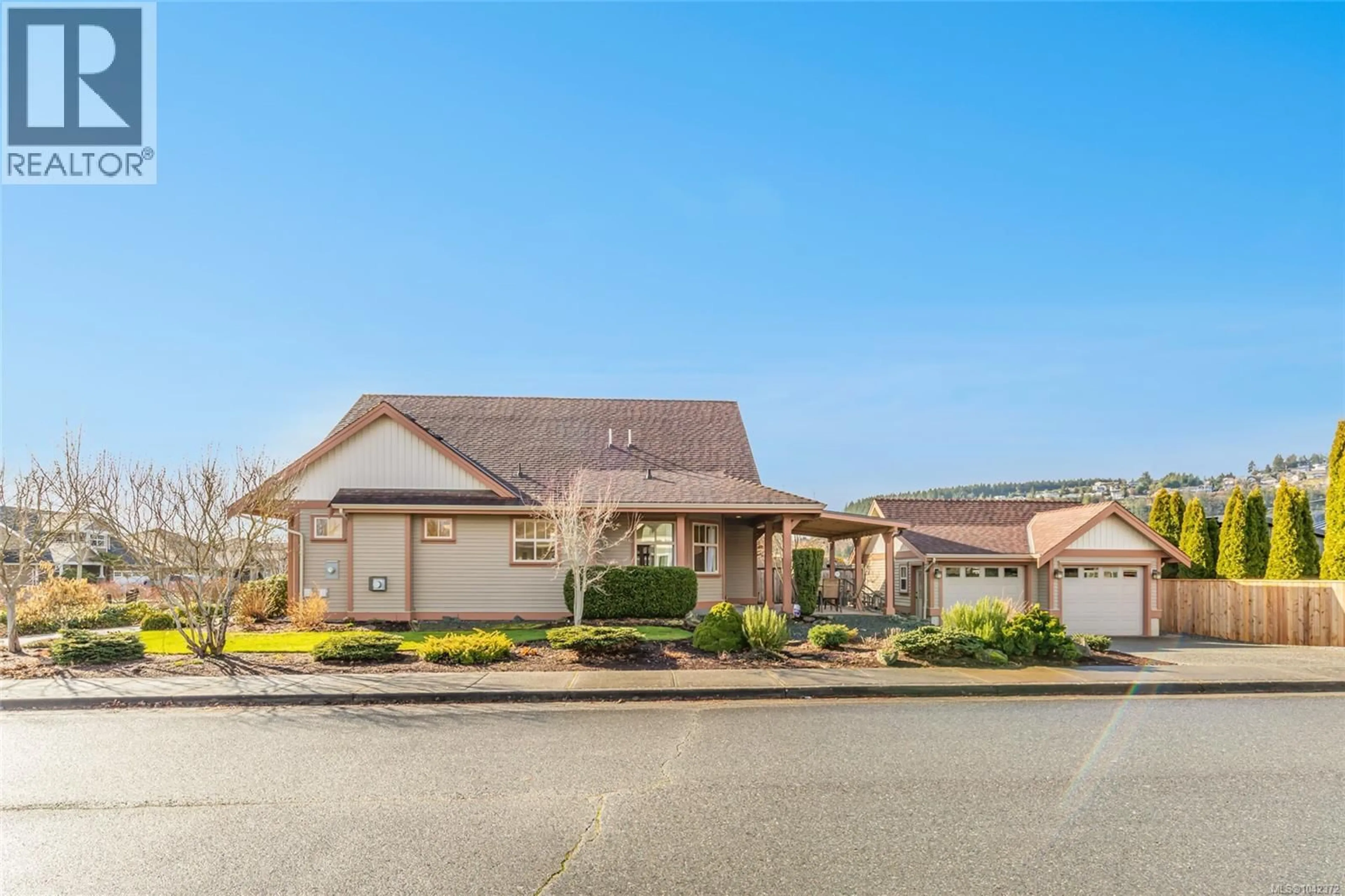 A pic from outside/outdoor area/front of a property/back of a property/a pic from drone, street for 421 POETS TRAIL DRIVE, Nanaimo British Columbia V9R7B1