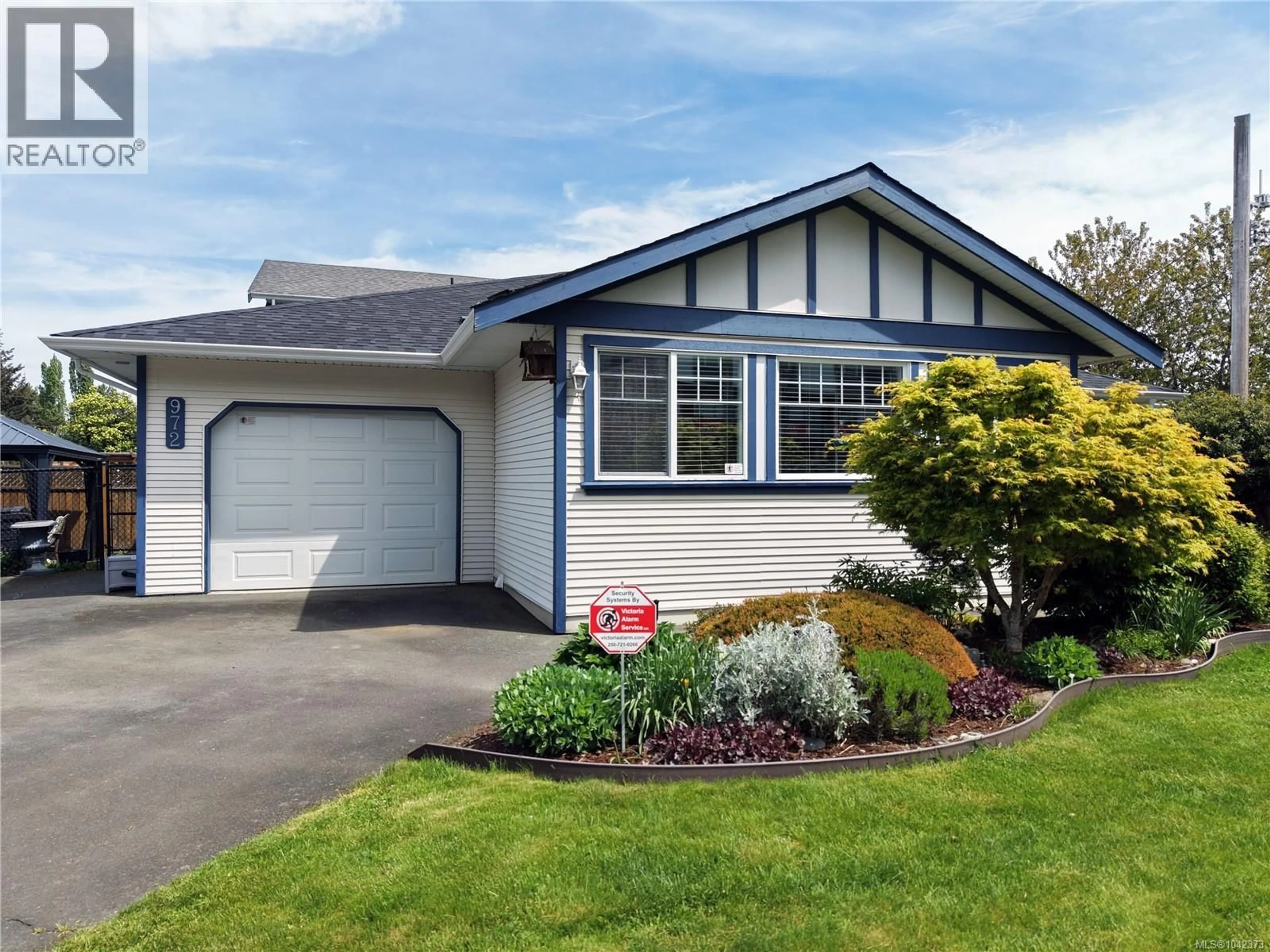 Home with vinyl exterior material, street for 972 WALFRED ROAD, Langford British Columbia V9C2P4