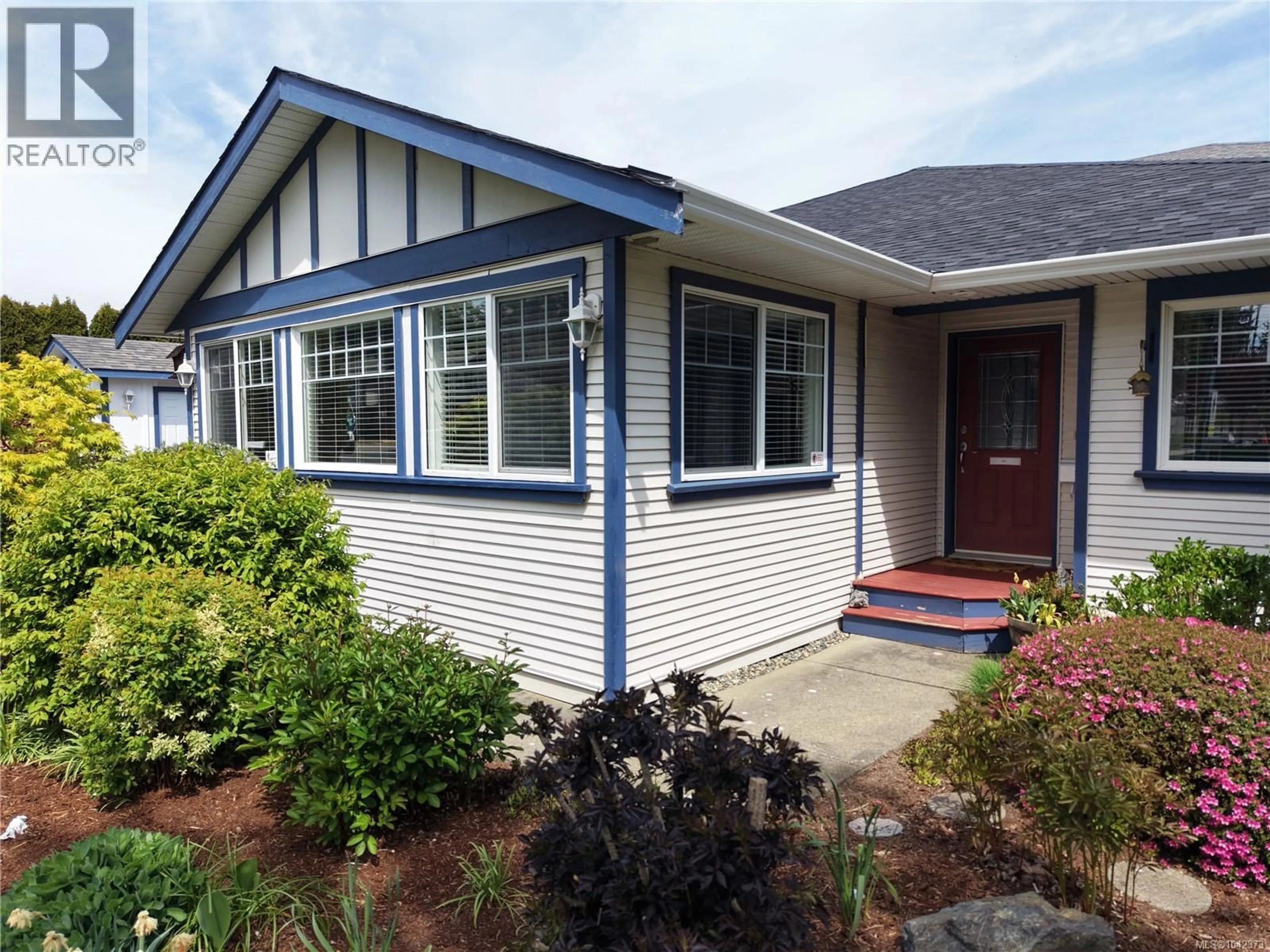 Home with vinyl exterior material, street for 972 WALFRED ROAD, Langford British Columbia V9C2P4
