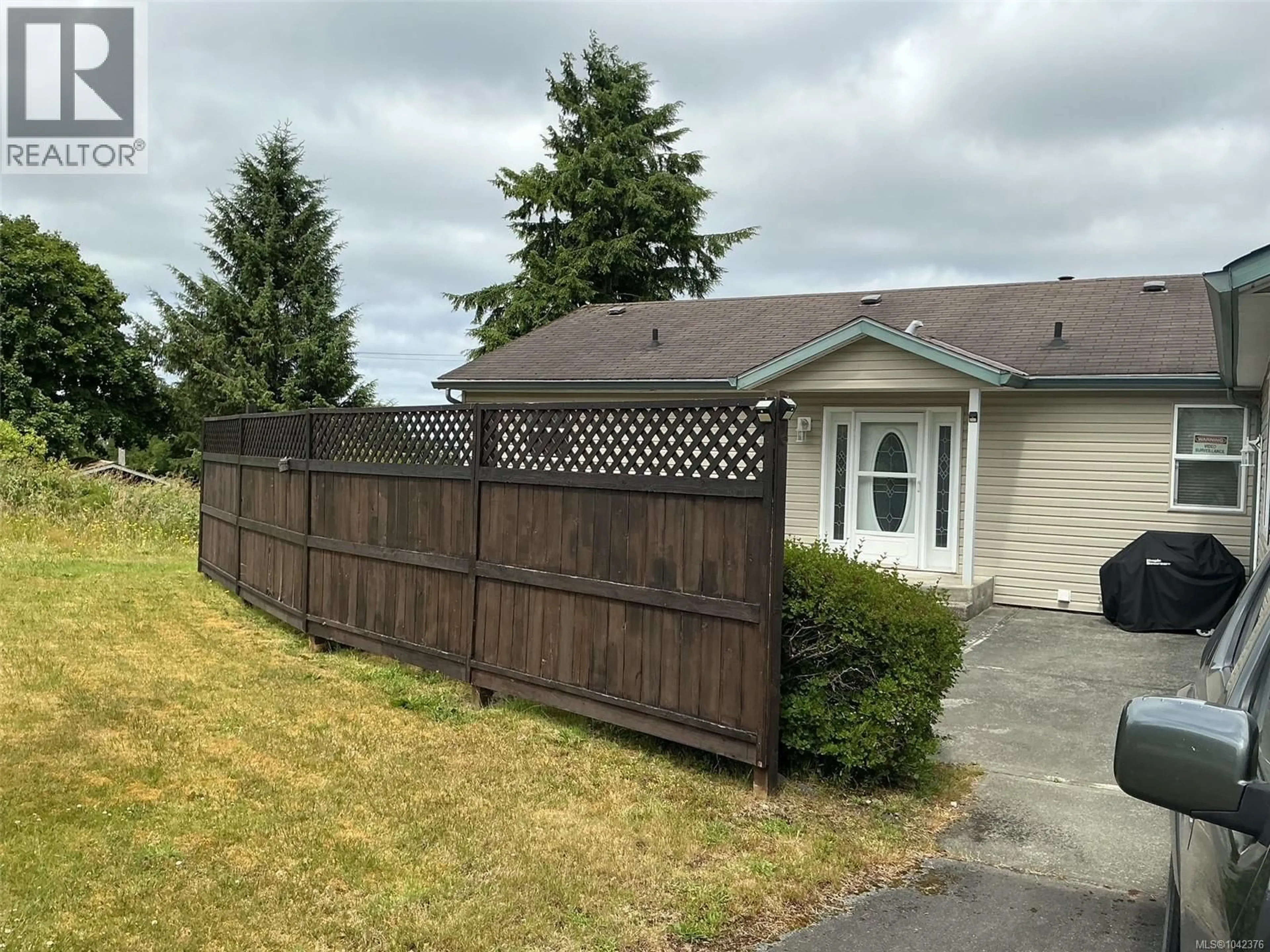 A pic from outside/outdoor area/front of a property/back of a property/a pic from drone, unknown for 6120 HUCKLEBERRY LANE, Port Hardy British Columbia V0N2P0