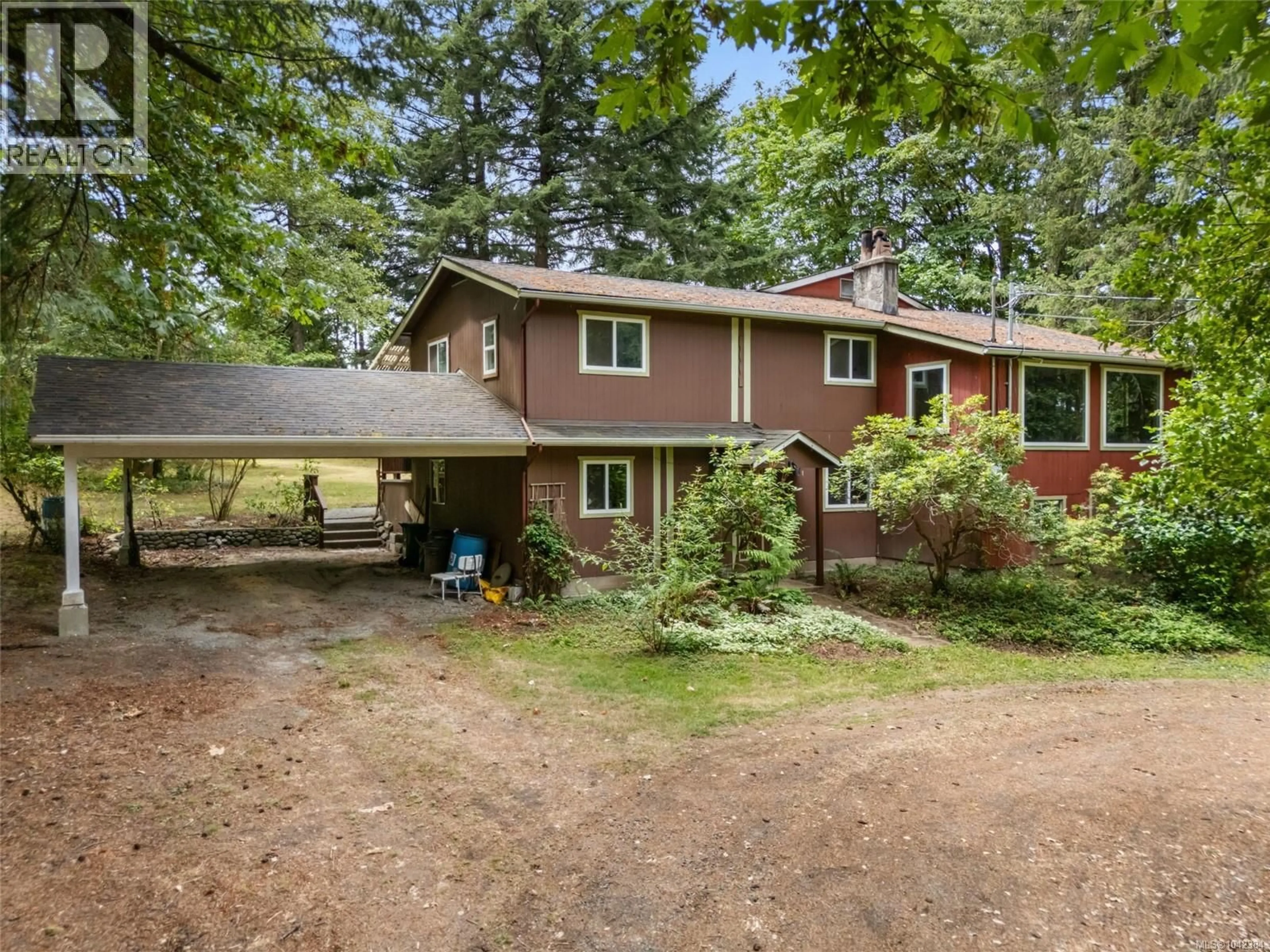 A pic from outside/outdoor area/front of a property/back of a property/a pic from drone, forest/trees view for 6025 CASTLEY ROAD, Duncan British Columbia V9L6K2