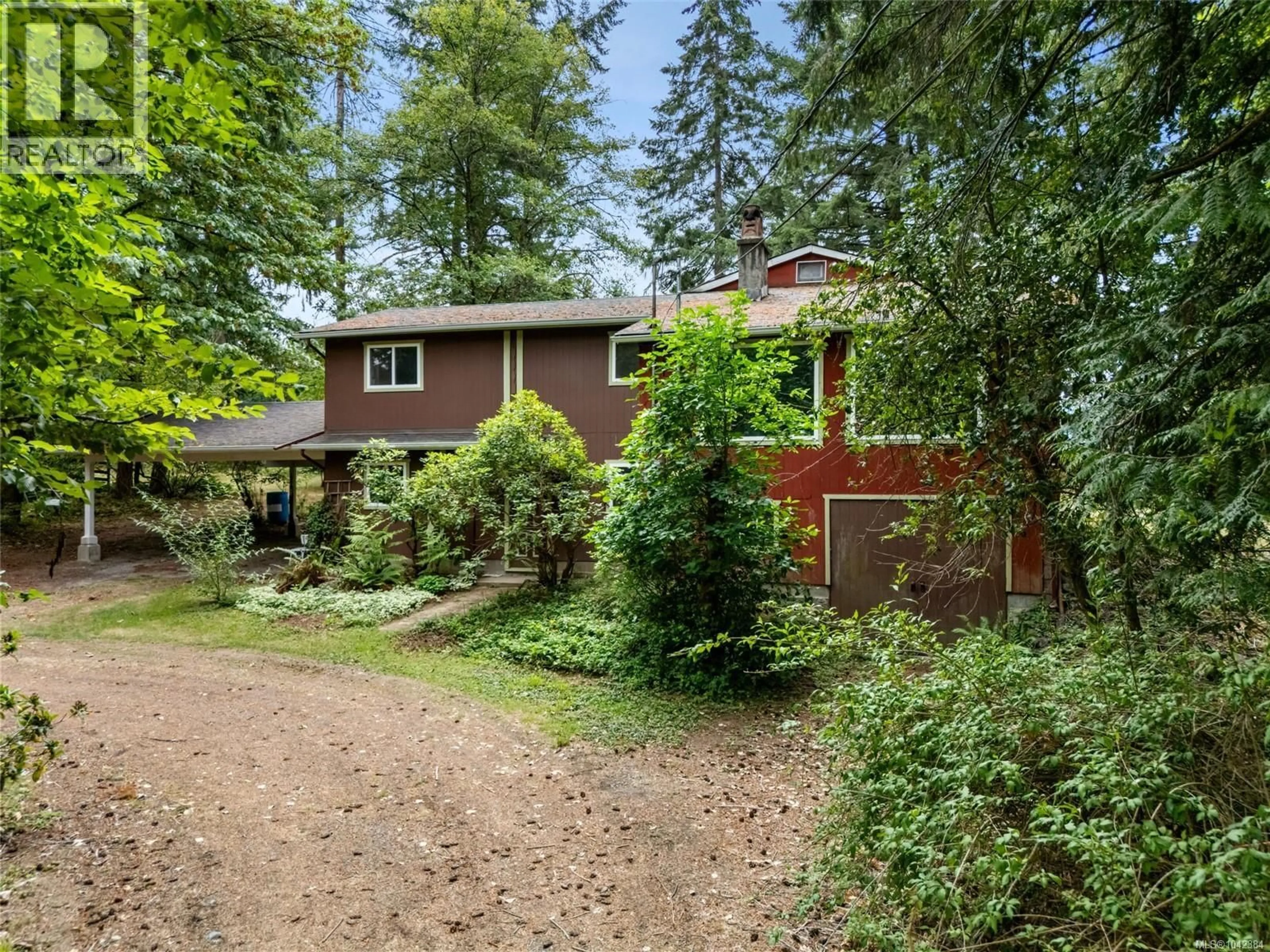A pic from outside/outdoor area/front of a property/back of a property/a pic from drone, forest/trees view for 6025 CASTLEY ROAD, Duncan British Columbia V9L6K2