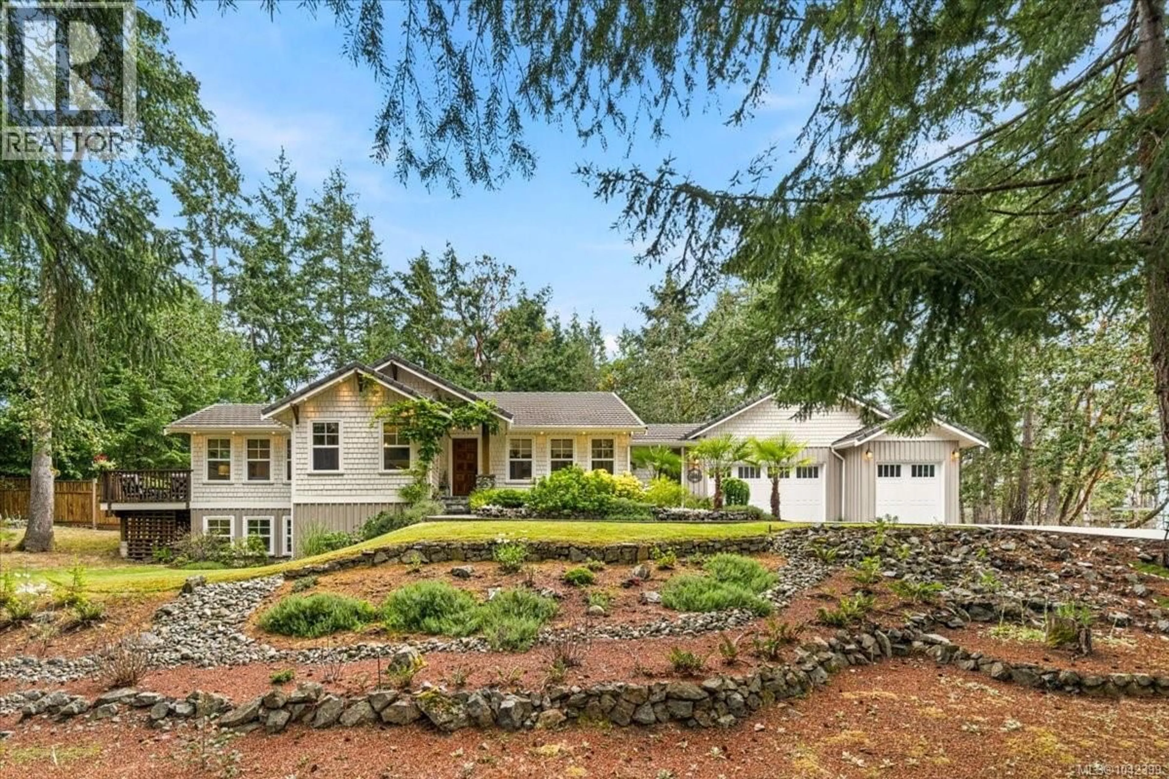 A pic from outside/outdoor area/front of a property/back of a property/a pic from drone, water/lake/river/ocean view for 3341 SCHOONER COVE DRIVE, Nanoose Bay British Columbia V9P9H6