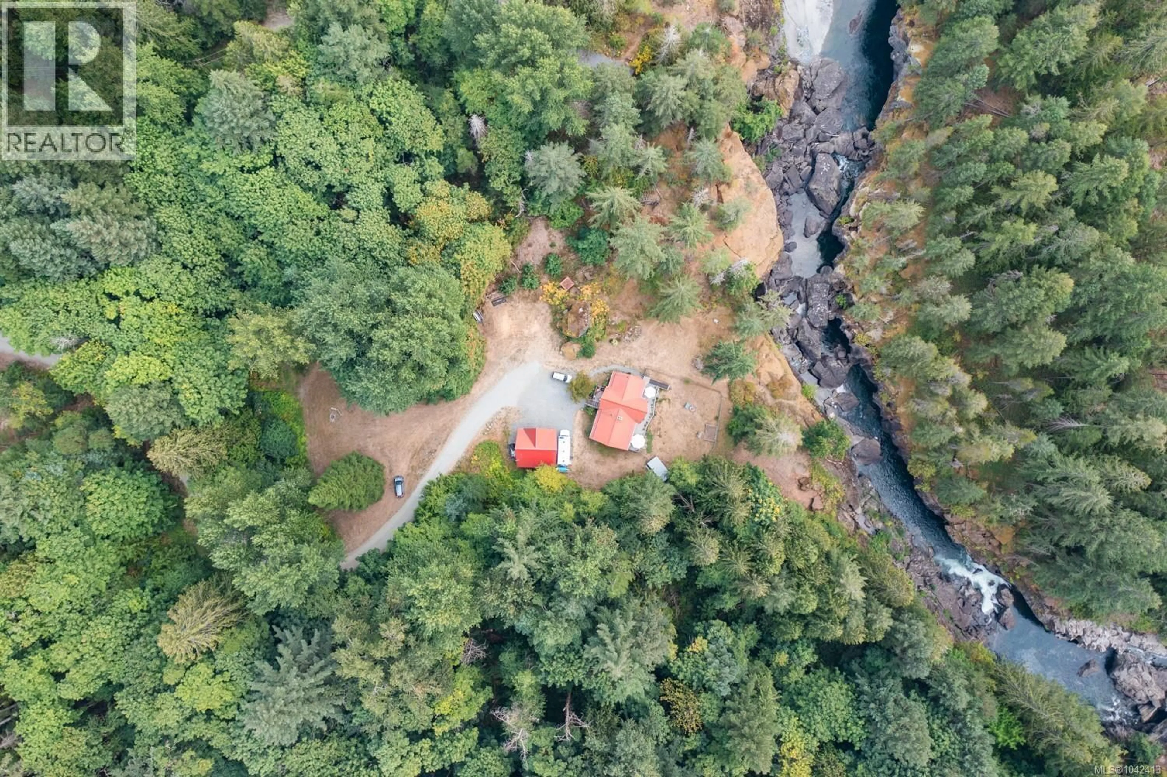 A pic from outside/outdoor area/front of a property/back of a property/a pic from drone, forest/trees view for 995 NANAIMO RIVER ROAD, Nanaimo British Columbia V9X1E5