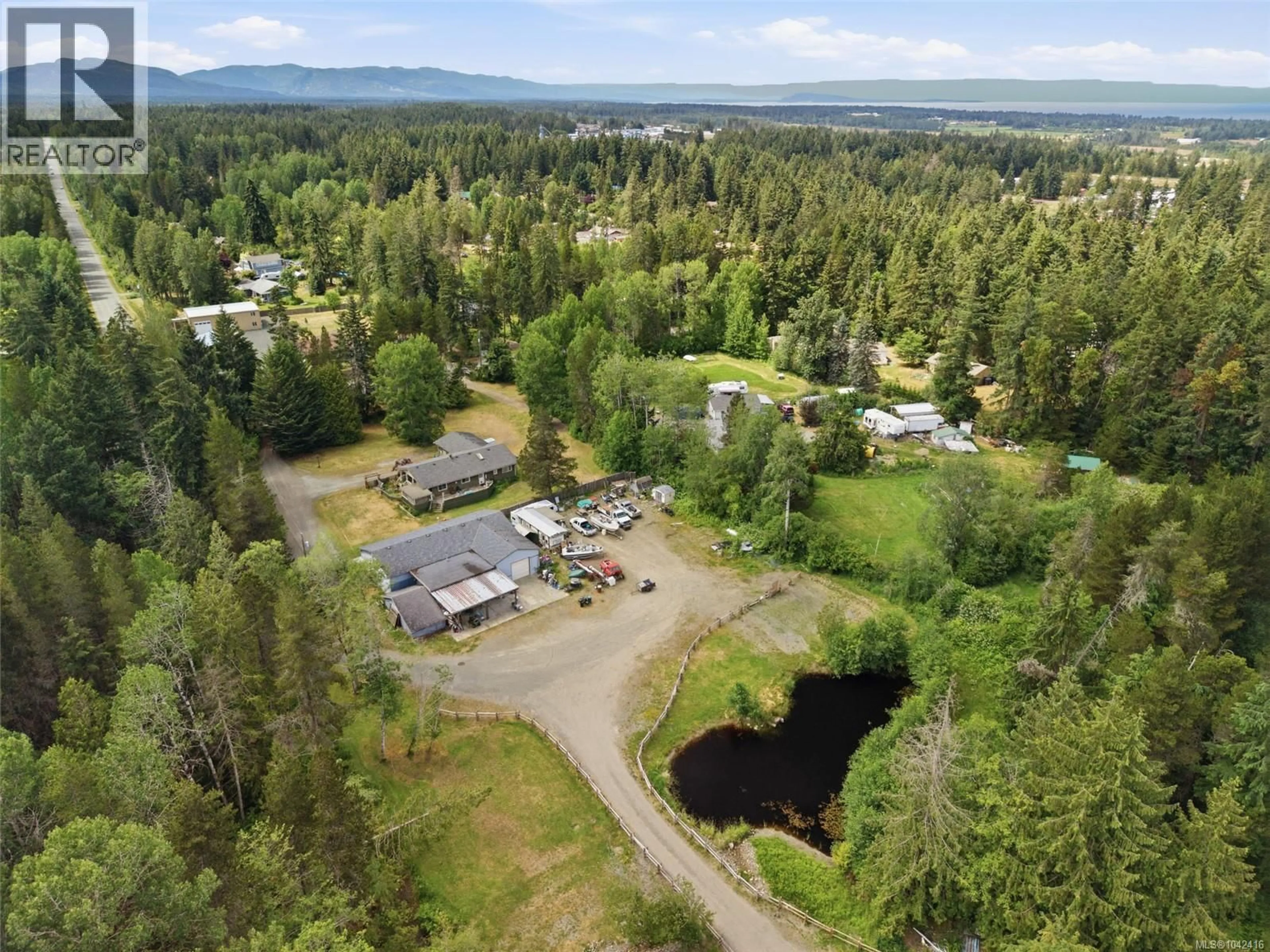 A pic from outside/outdoor area/front of a property/back of a property/a pic from drone, unknown for 1144 BELLEVUE ROAD, Errington British Columbia V9P2C4