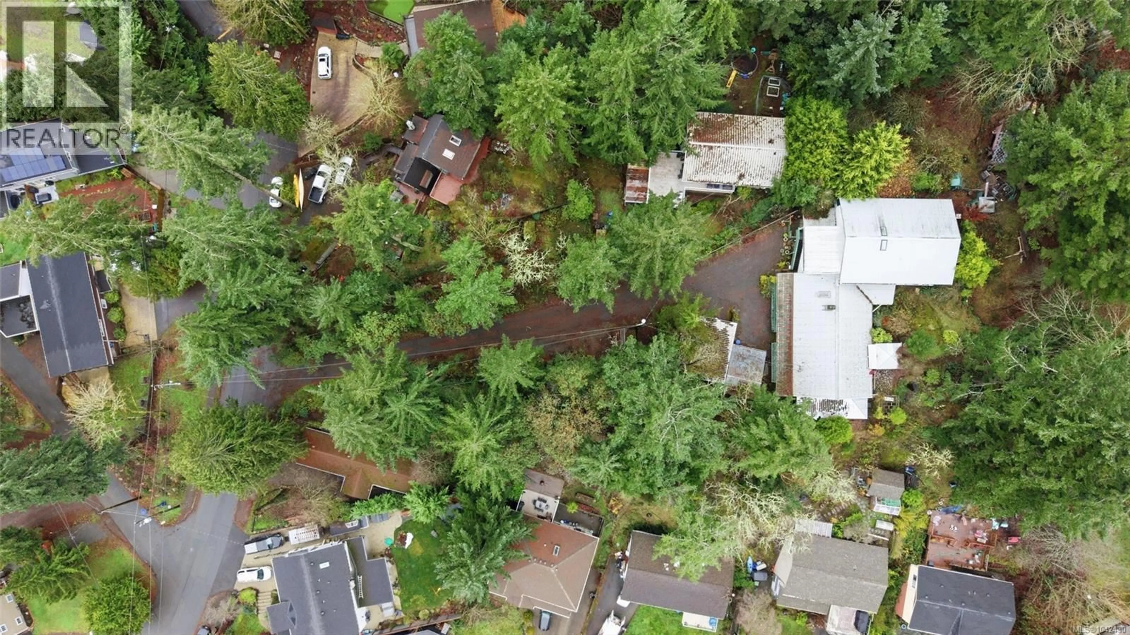A pic from outside/outdoor area/front of a property/back of a property/a pic from drone, forest/trees view for 2511 FLORENCE LAKE ROAD, Langford British Columbia V9B4H3